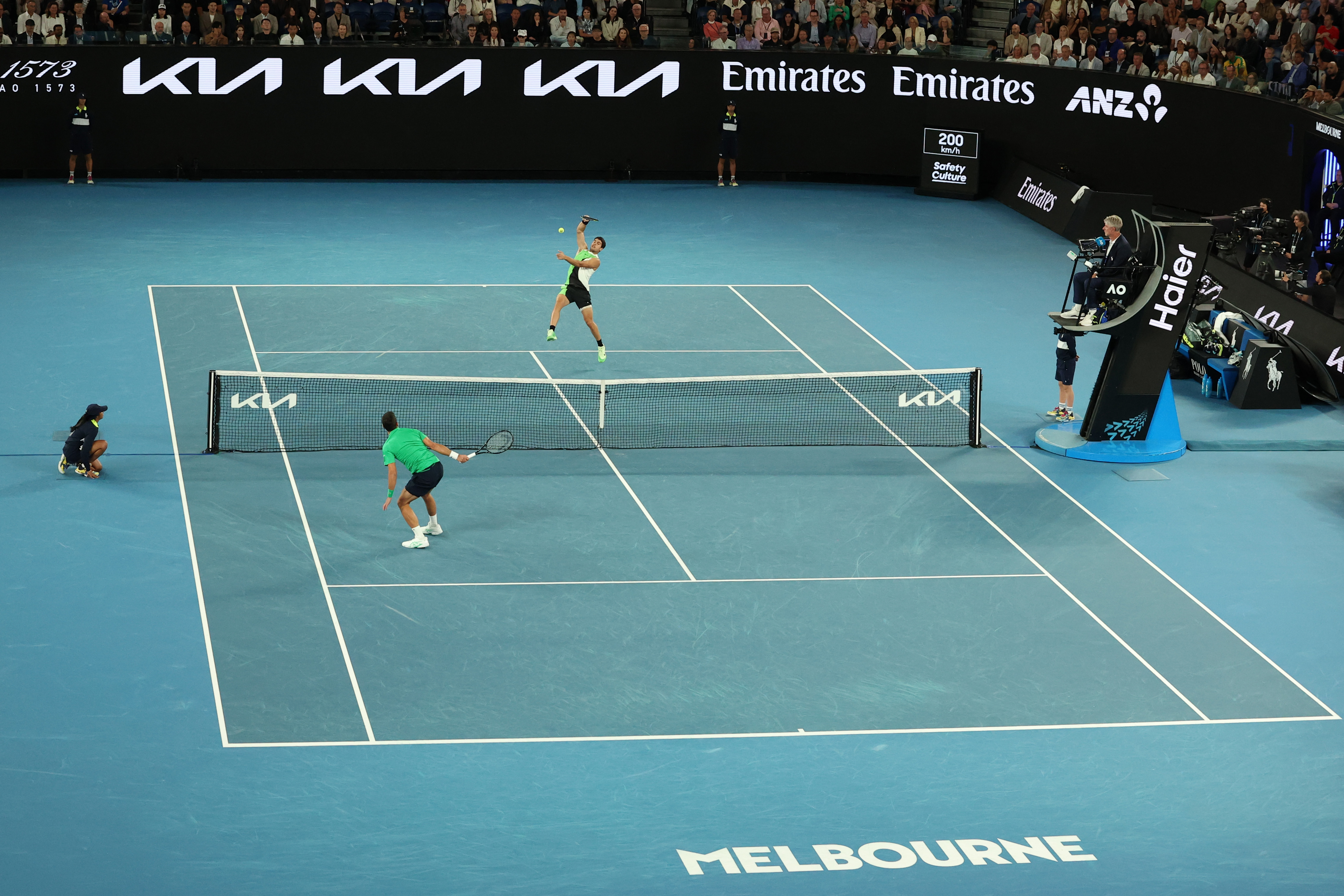 MELBOURNE, AUSTRALIA - FEBRUARY 01: Carlos Alcaraz of Spain plays a forehand in the Men's Singles Final against Novak Djokovic of Serbia during day 15 of the 2026 Australian Open at Melbourne Park on February 01, 2026 in Melbourne, Australia. (Photo by Kelly Defina/Getty Images)