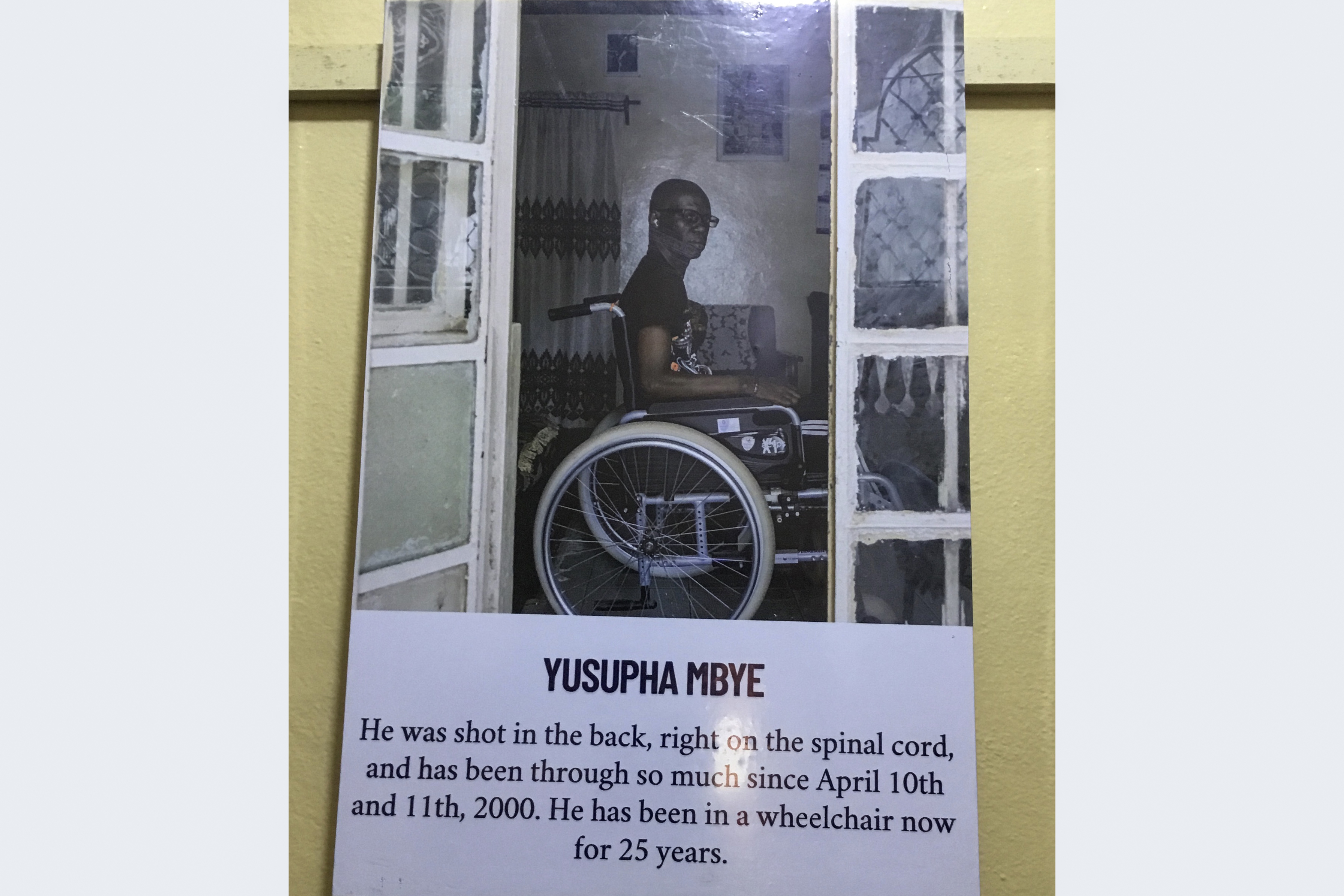 Yusupha’s photograph hangs on the wall of the Victims’ Centre.