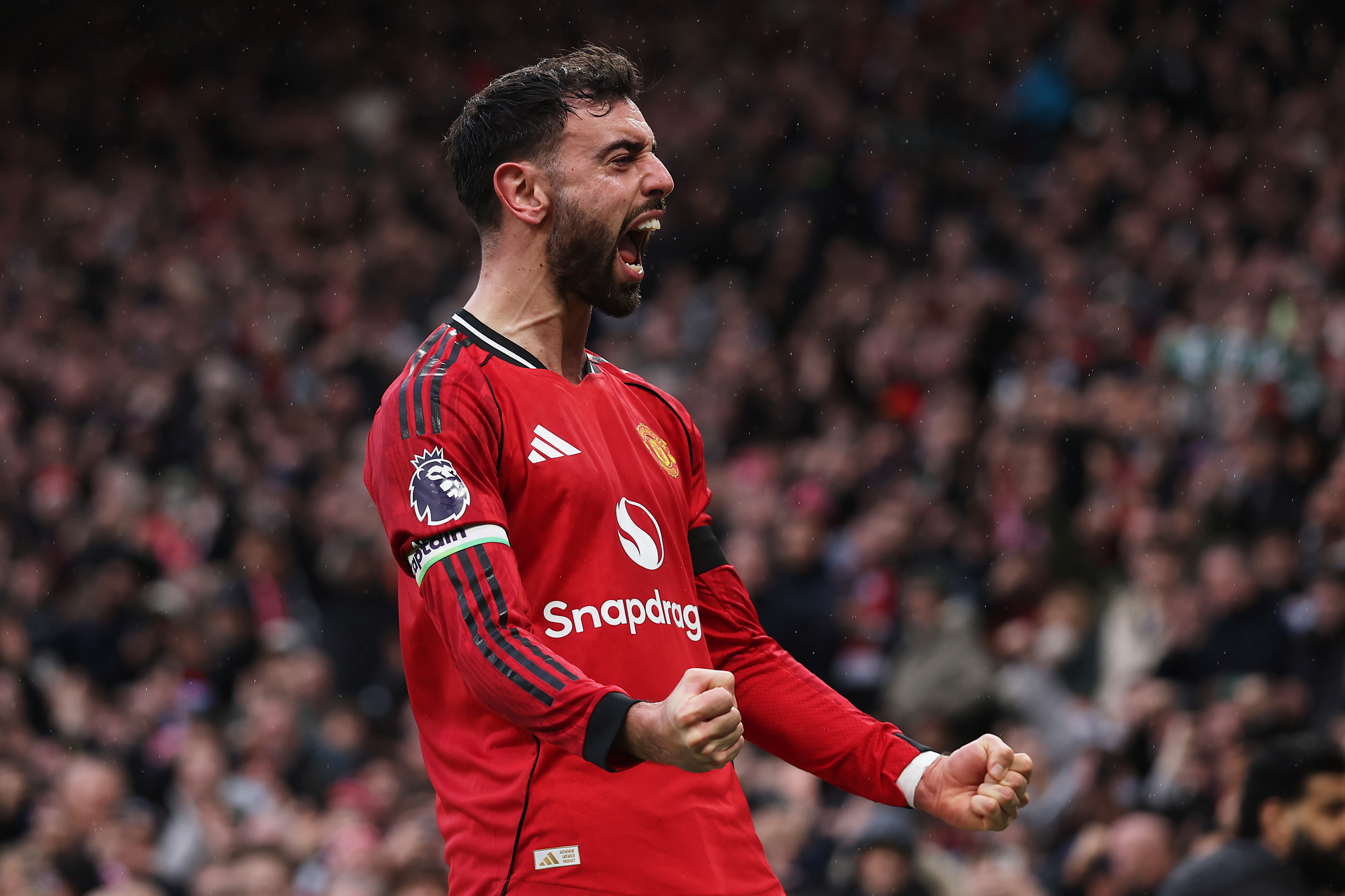 MANCHESTER, ENGLAND - FEBRUARY 07: Bruno Fernandes of Manchester United celebrates scoring his team's second goalduring the Premier League match between Manchester United and Tottenham Hotspur at Old Trafford on February 07, 2026 in Manchester, England. (Photo by Carl Recine/Getty Images)