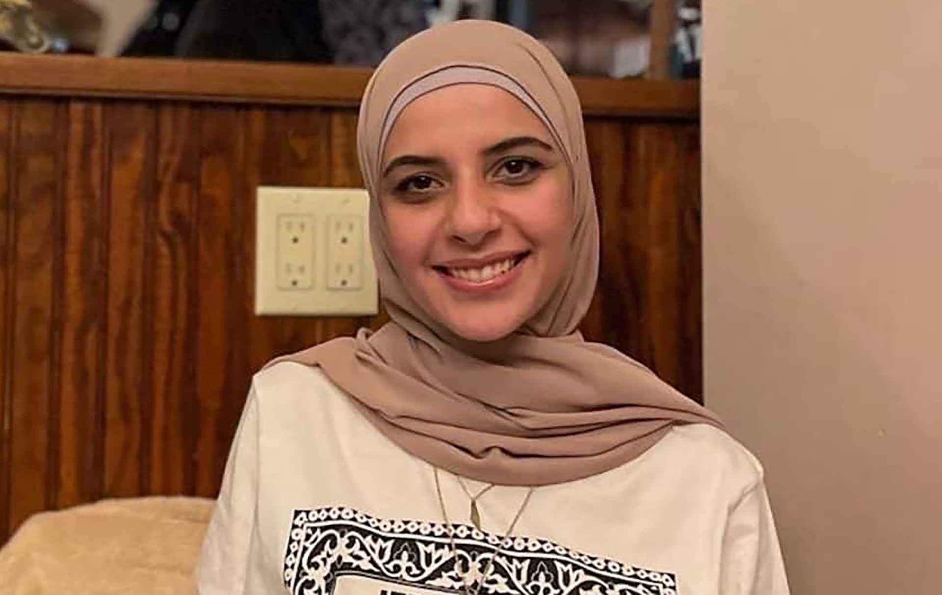 Leqaa Kordia sits for a photo