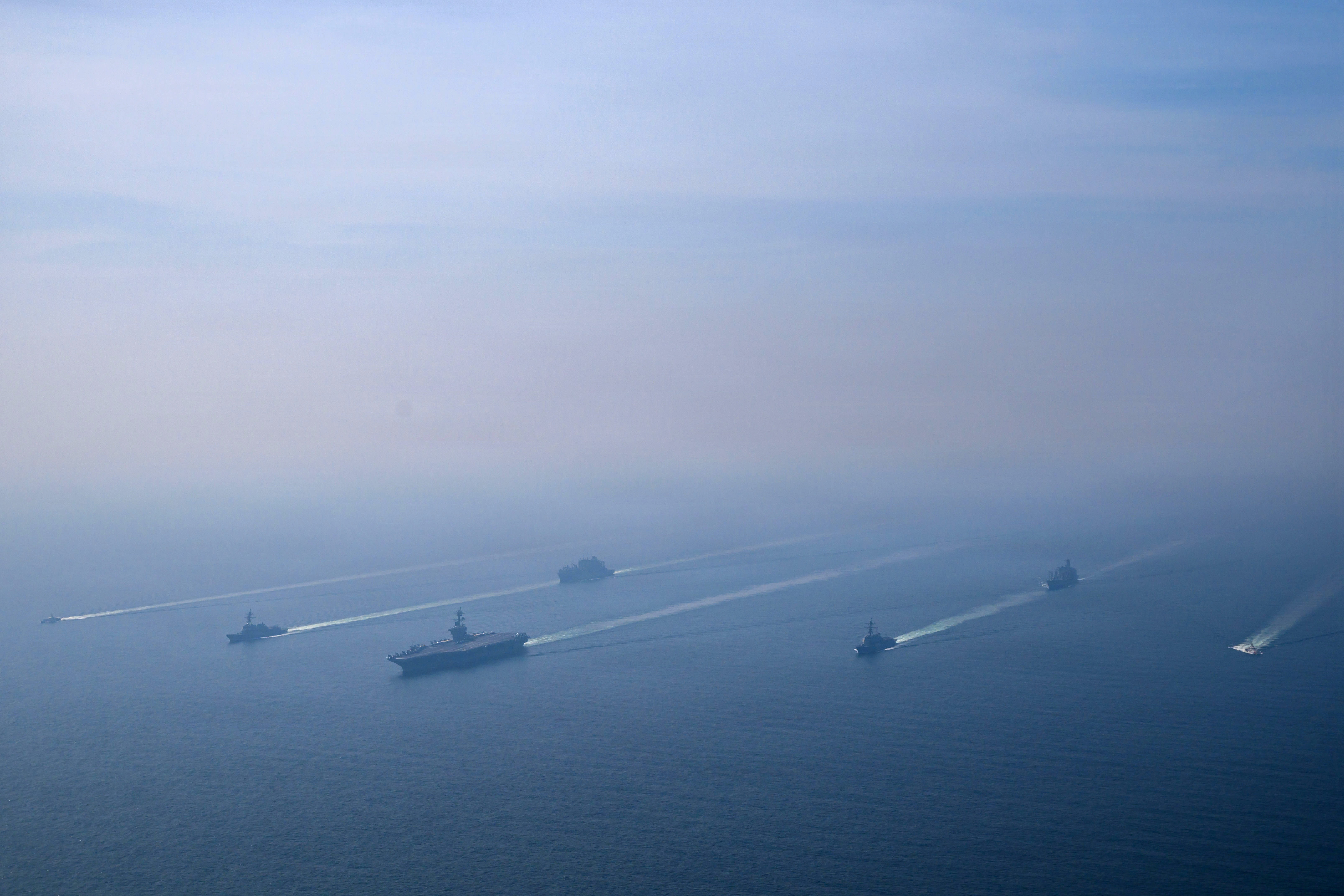 The U.S. Navy's Nimitz-class aircraft carrier USS Abraham Lincoln leads its strike group during a photo exercise in the Arabian Sea, February 6, 2026. U.S. Navy/Mass Communication Specialist 1st Class Jesse Monford/Handout via REUTERS THIS IMAGE HAS BEEN SUPPLIED BY A THIRD PARTY