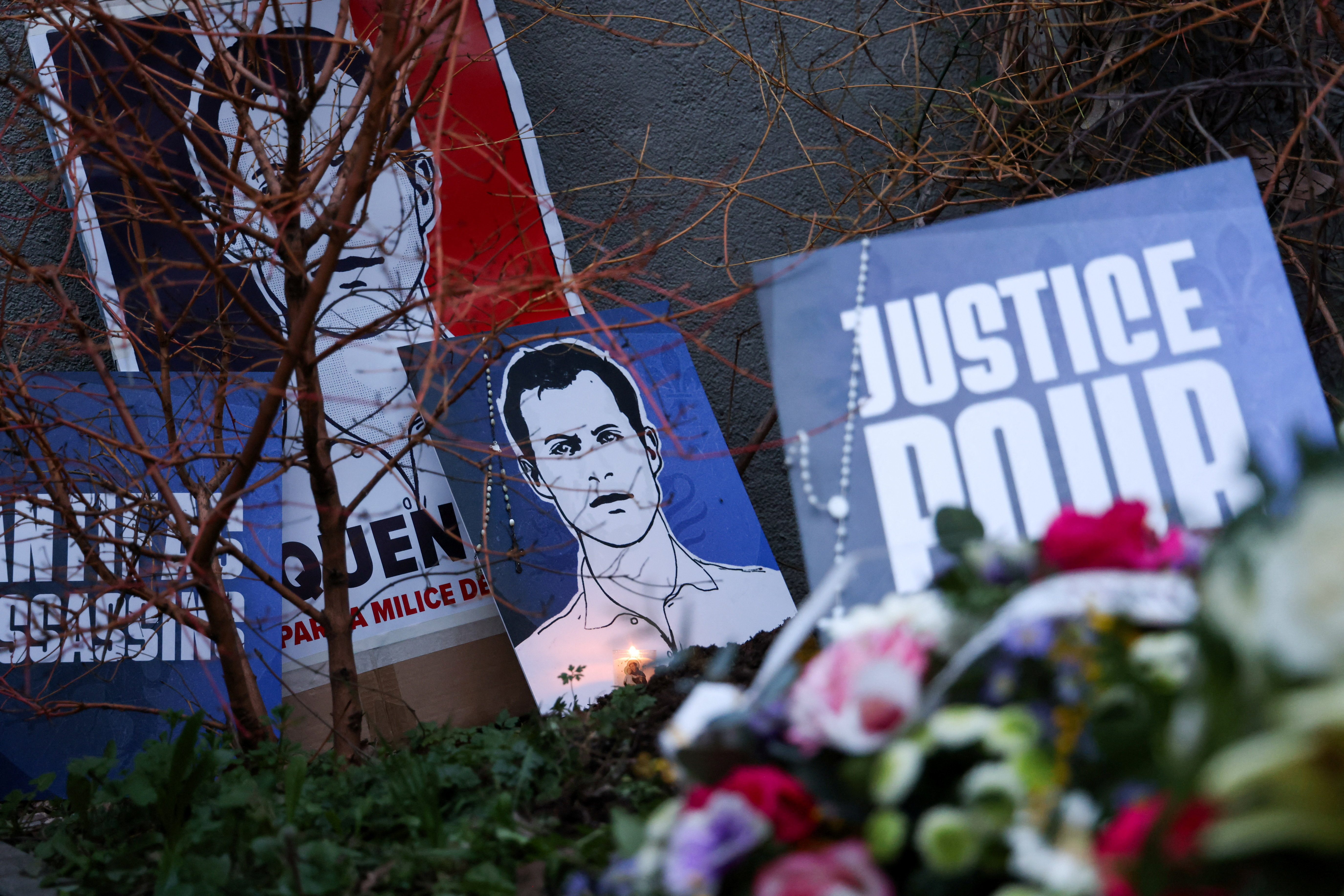 Makeshift memorial in tribute to Quentin Deranque, a young far-right activist beaten to death during a violent assault by hard-left activists, at the site where the attack took place, in Lyon, France, February 21, 2026. REUTERS/Nicolas Economou