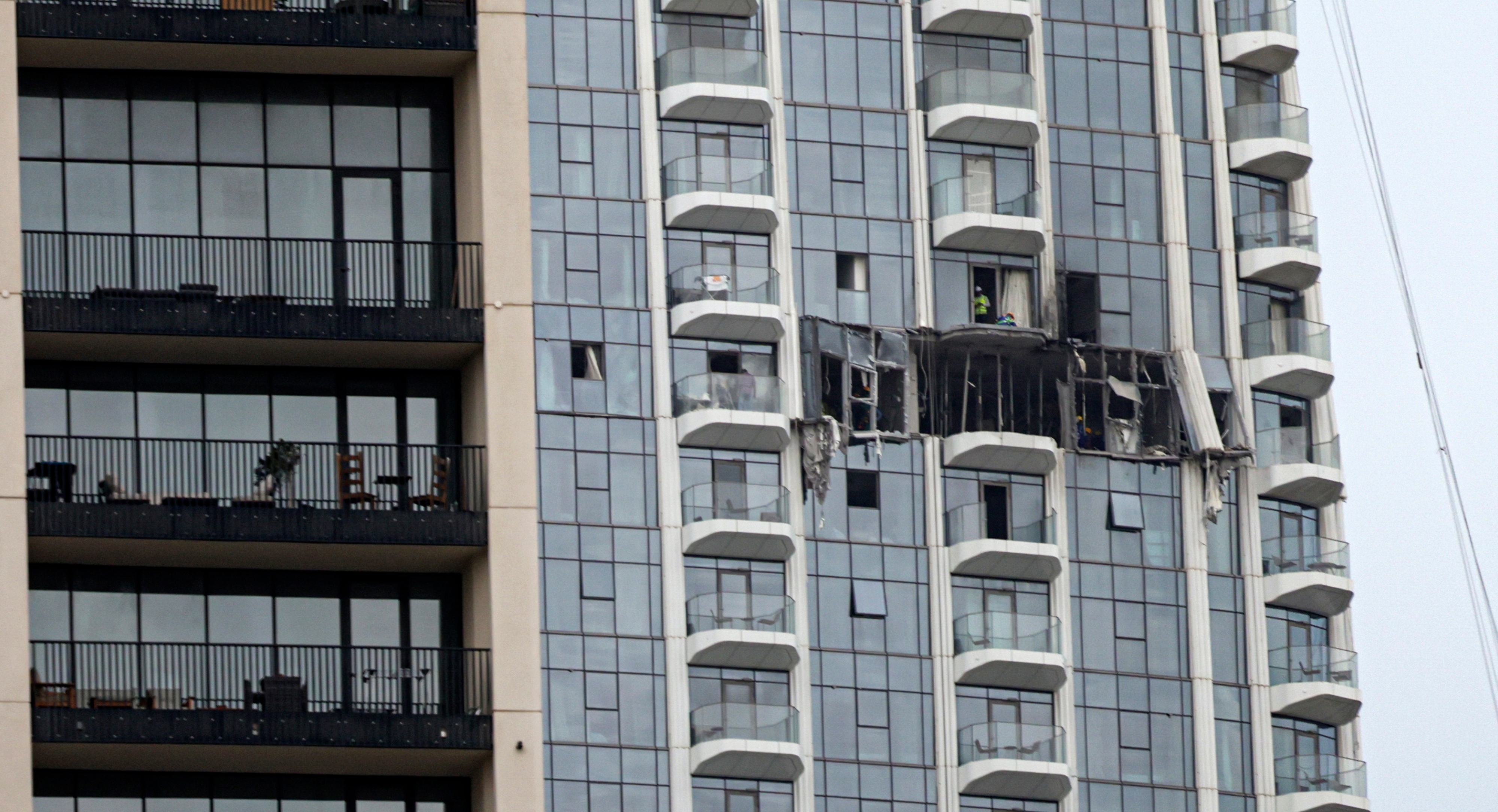 A view of the damaged part of the Dubai Creek Harbour tower after it was hit by an Iranian drone attack in Dubai, United Arab Emirates [EPA]