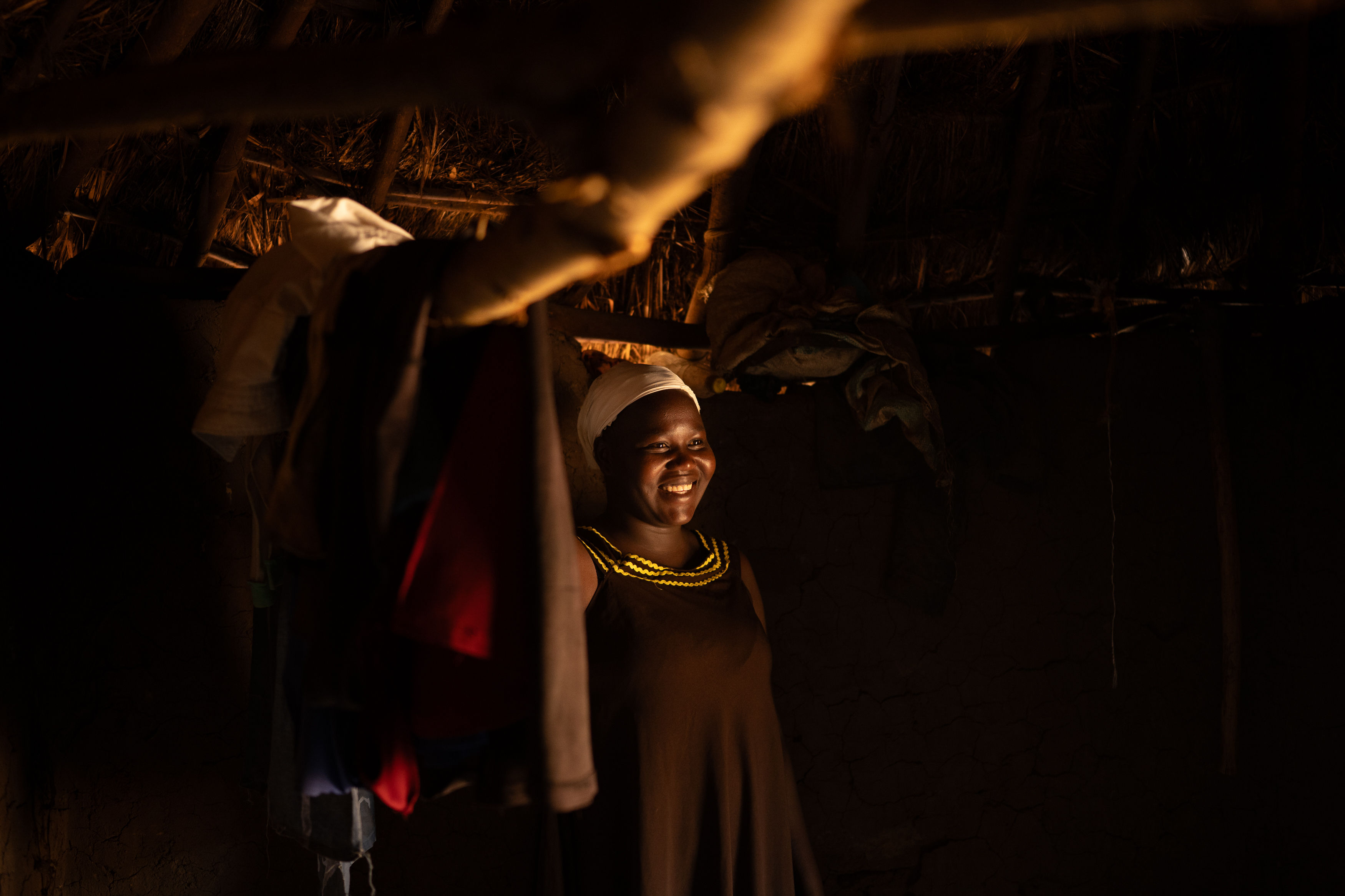 10th February 2026. Owalai, Uganda. Martha Apolot, 21. Martha is the single mother of Aaron Elayu, 8. Aaron lives with an undiagnosed disability and is cared for solely by his young mother Martha after she fell pregnant in dubious circumstances at age 13. She has been shunned by her family and recieves little assistance from them. Photograph by Christopher Hopkins