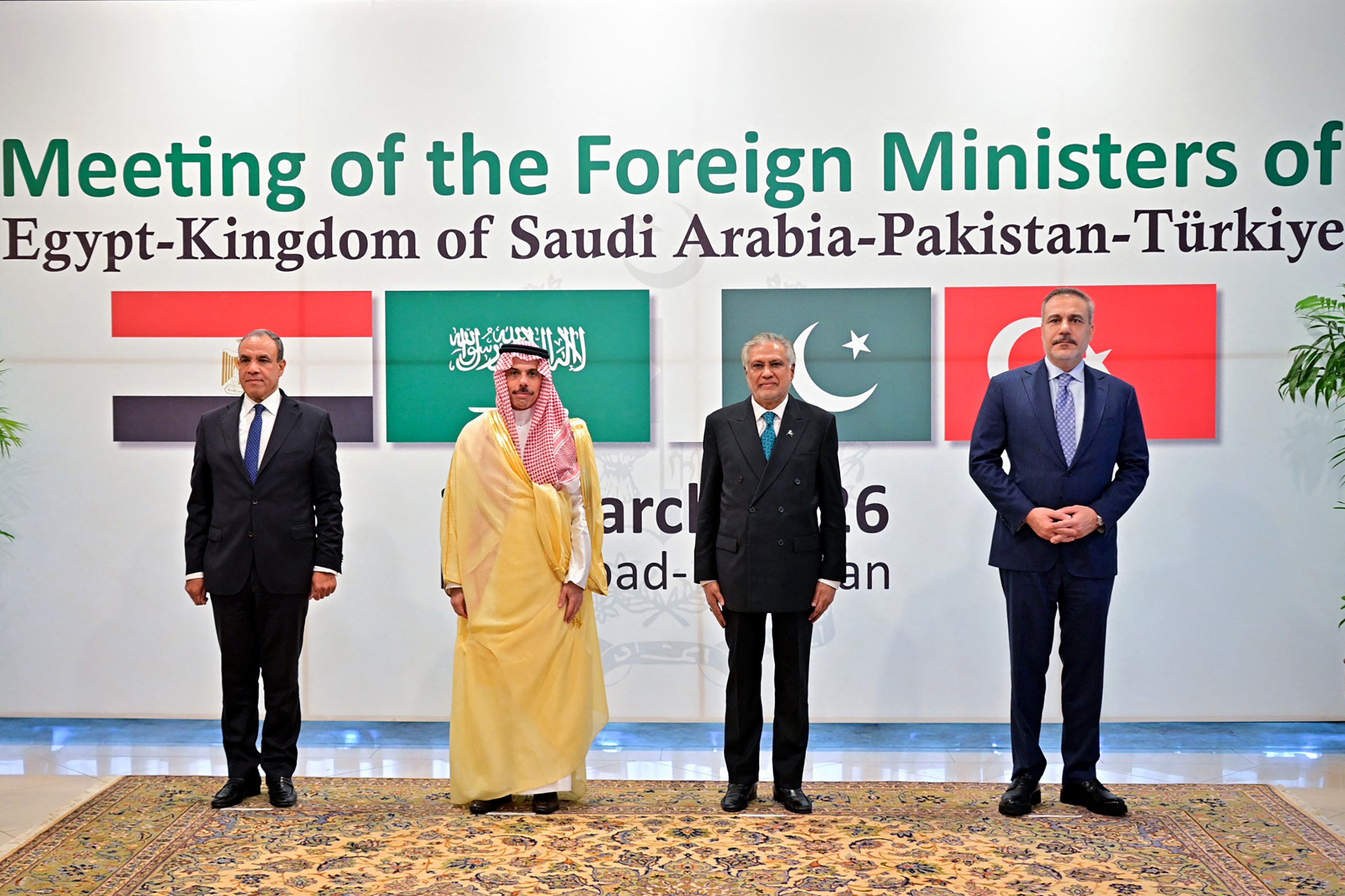 This handout photograph taken on March 29, 2026 and released by Pakistan's Ministry of Foreign Affairs shows Pakistan's Foreign Minister Ishaq Dar (2R) poses for a photograph with his counterparts Turkey's Hakan Fidan (R), Saudi Arabia's Faisal bin Farhan (2L) and Egypt's Badr Abdelatty before their meeting at the Foreign Ministry office in Islamabad.