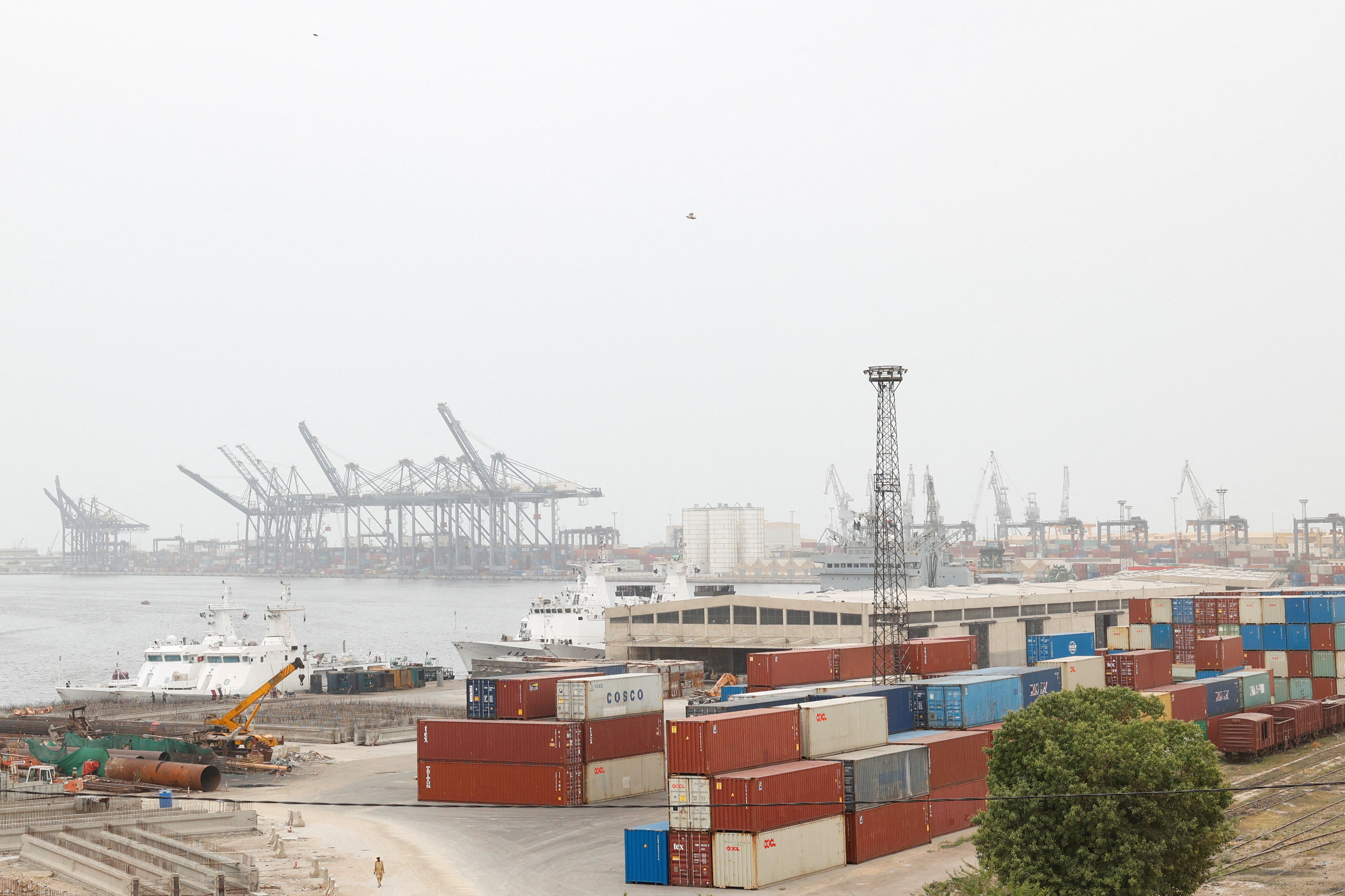 Shipping containers are stacked at the Karachi port area in Karachi, Pakistan, July 31, 2025. REUTERS/Akhtar Soomro