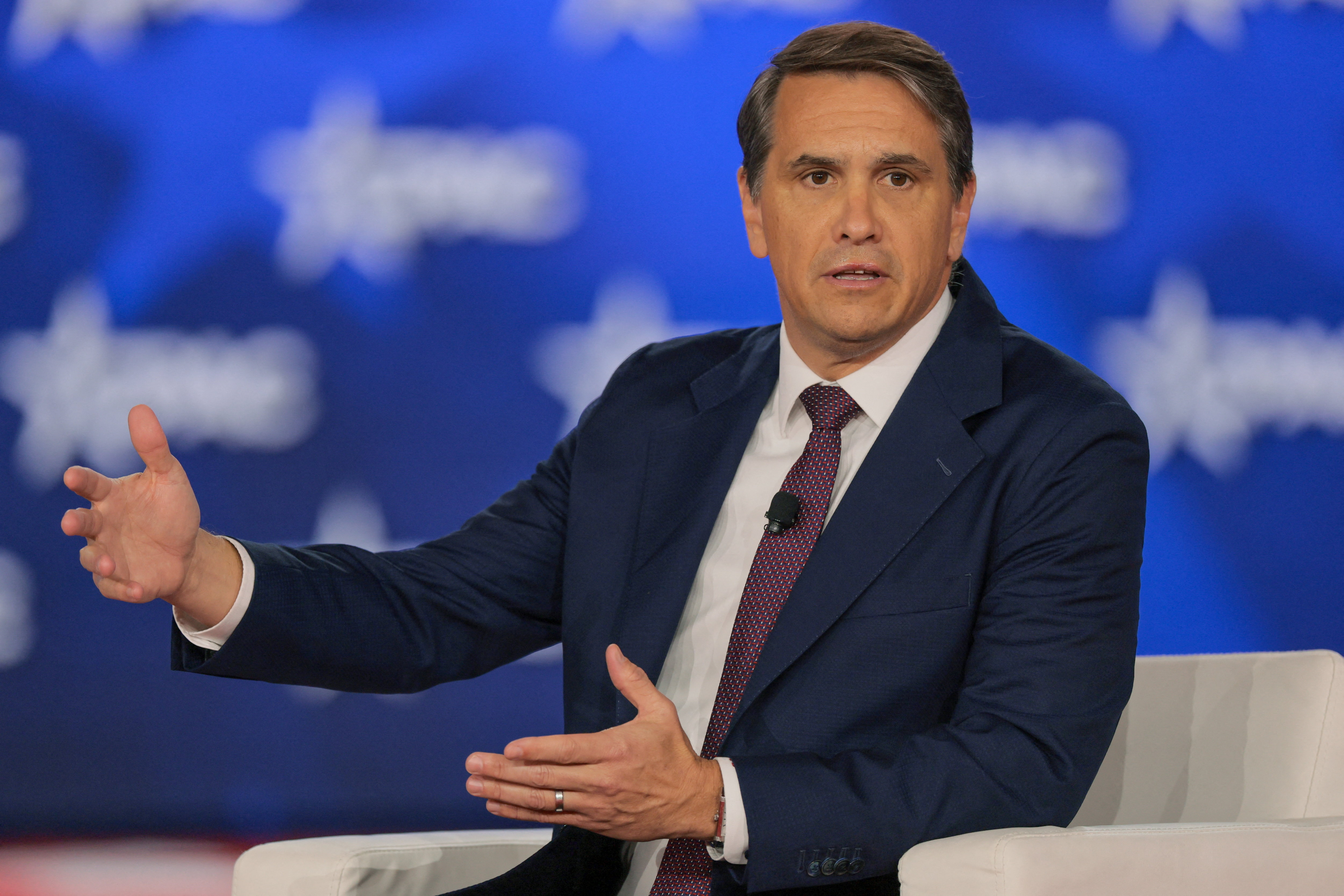 Todd Blanche speaks at an event