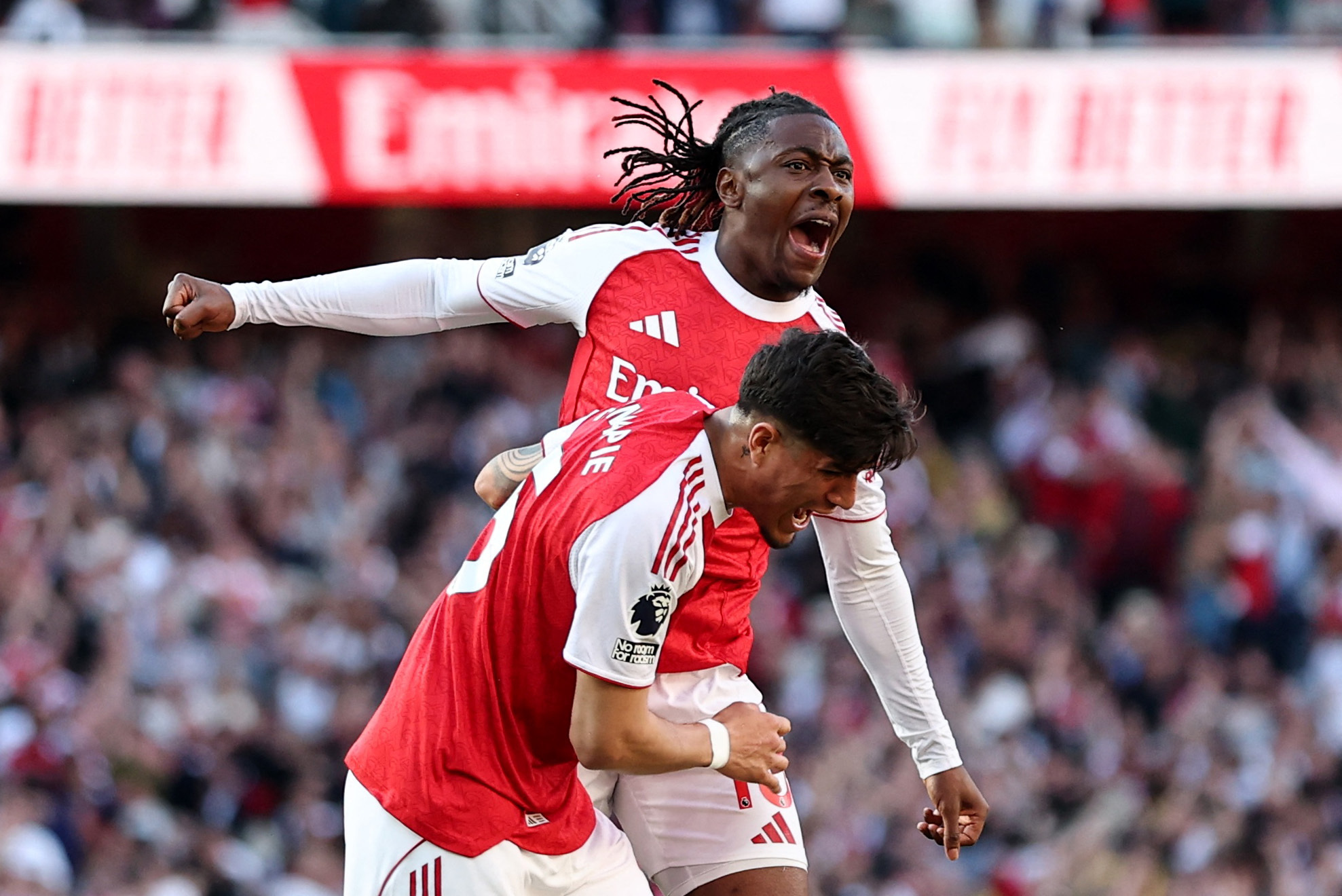 Arsenal's Eberechi Eze celebrates scoring their first goal with Piero Hincapie