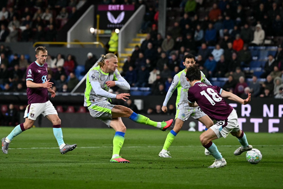Erling Haaland shoots but fails to score during the English Premier League football match between Burnley and Manchester City