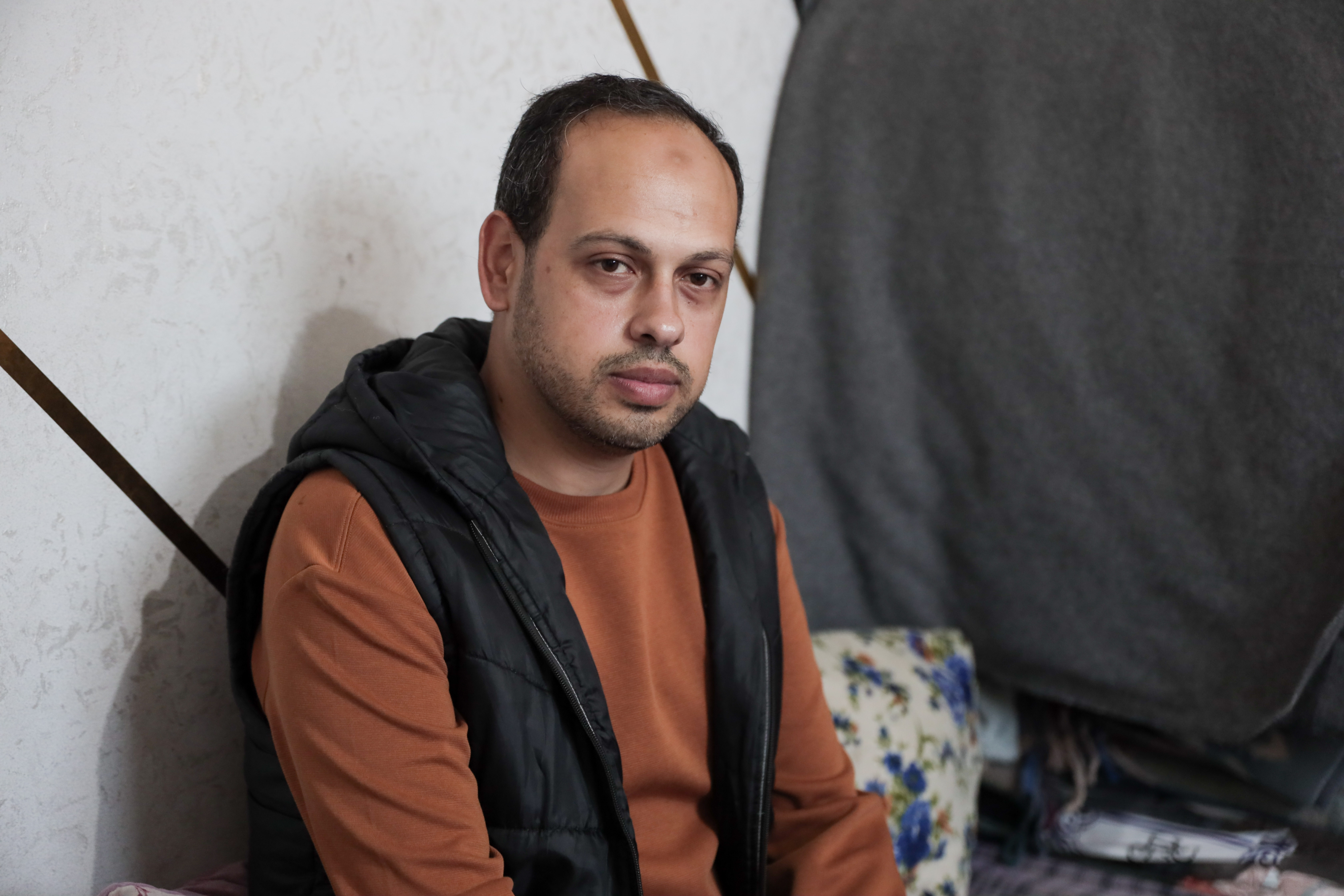 Mohammed Lubbad at his home in Deir Al Balah central the Gaza Strip [Abdelhakim Abu Riash/ Al Jazeera]
