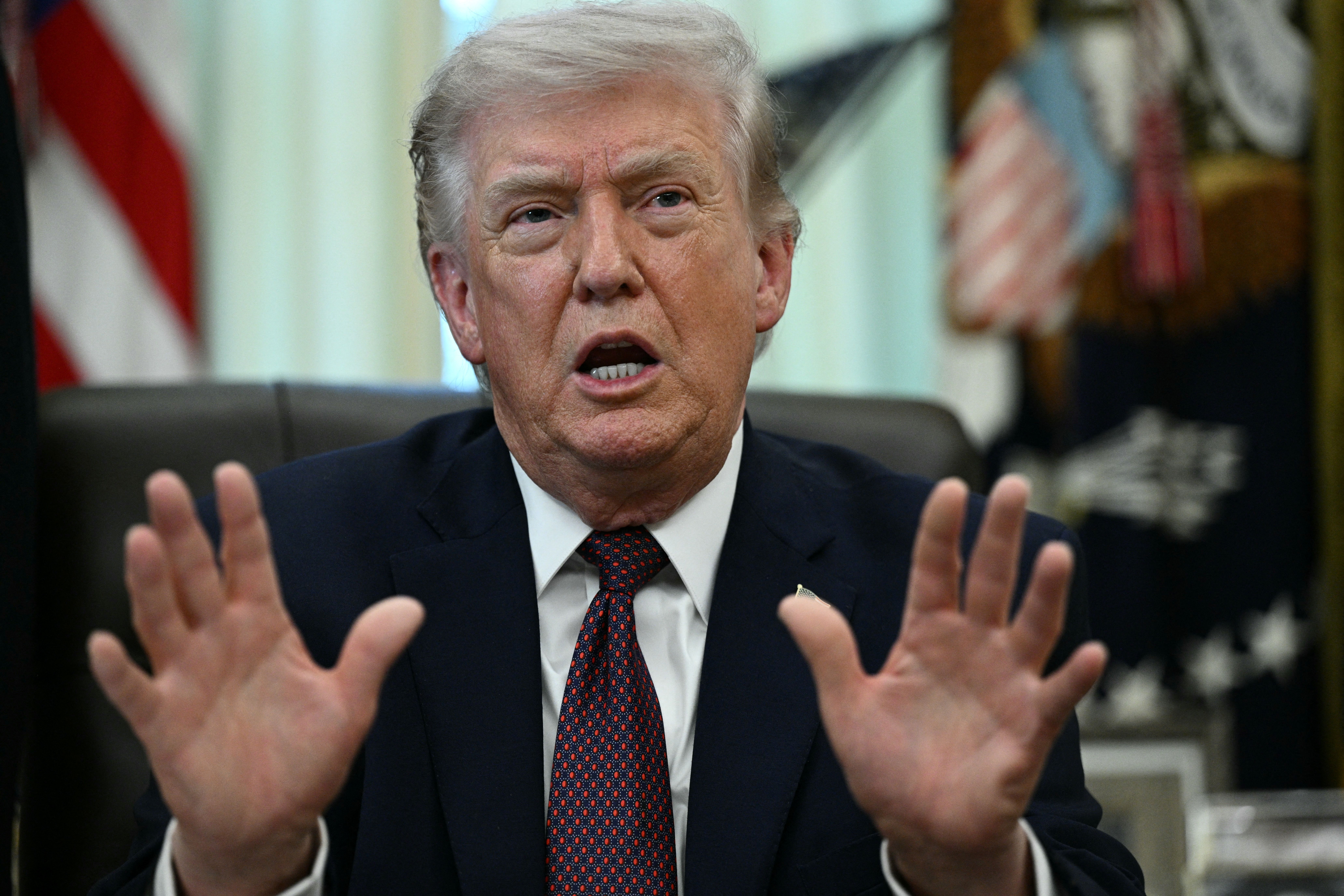 US President Donald Trump speaks after signing an executive order in the Oval Office of the White House in Washington, DC, on March 31, 2026. (Photo by Brendan SMIALOWSKI / AFP)