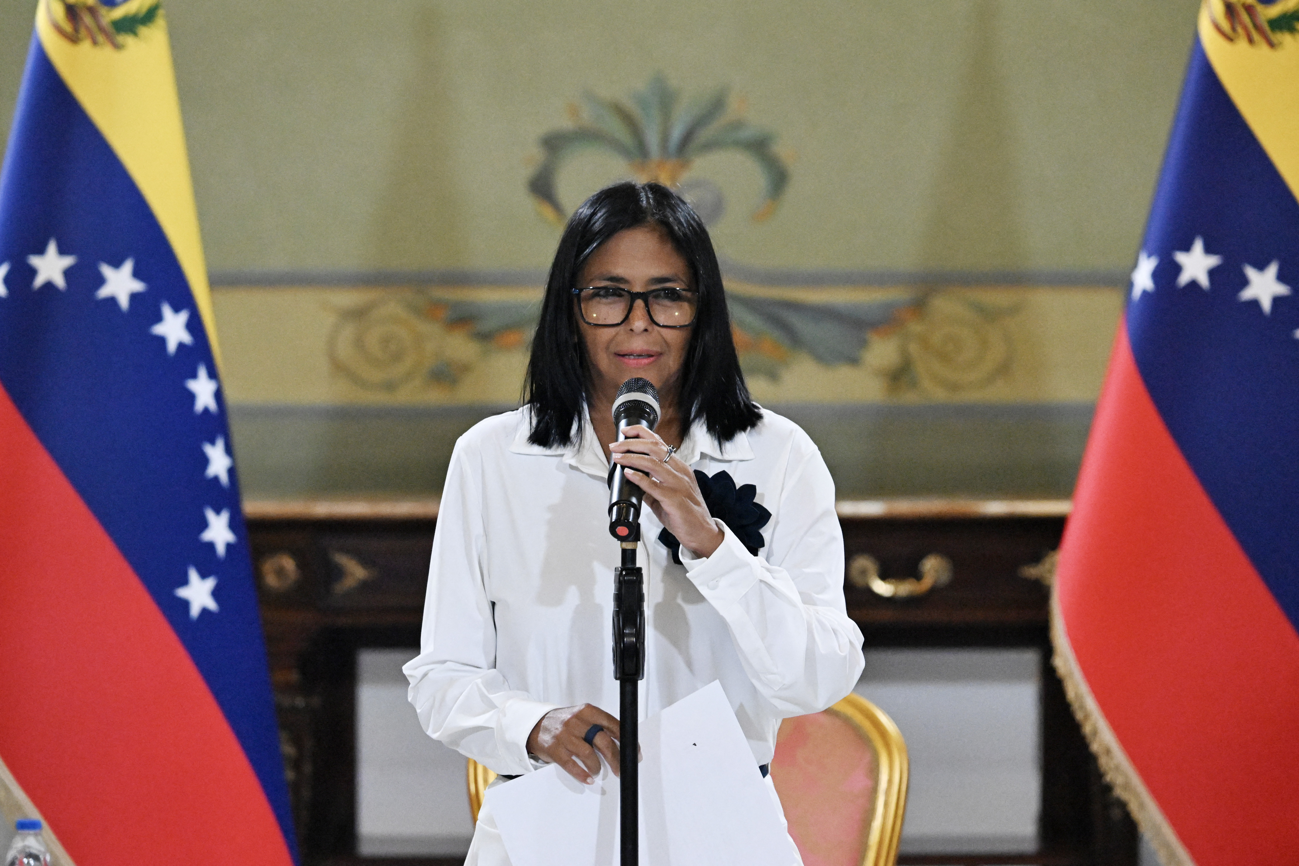 Venezuela's interim President Delcy Rodriguez speaks during a press conference after a signing of an agreement ceremony between Chevron Venezuela and the national government at the Miraflores Palace in Caracas on April 13, 2026.