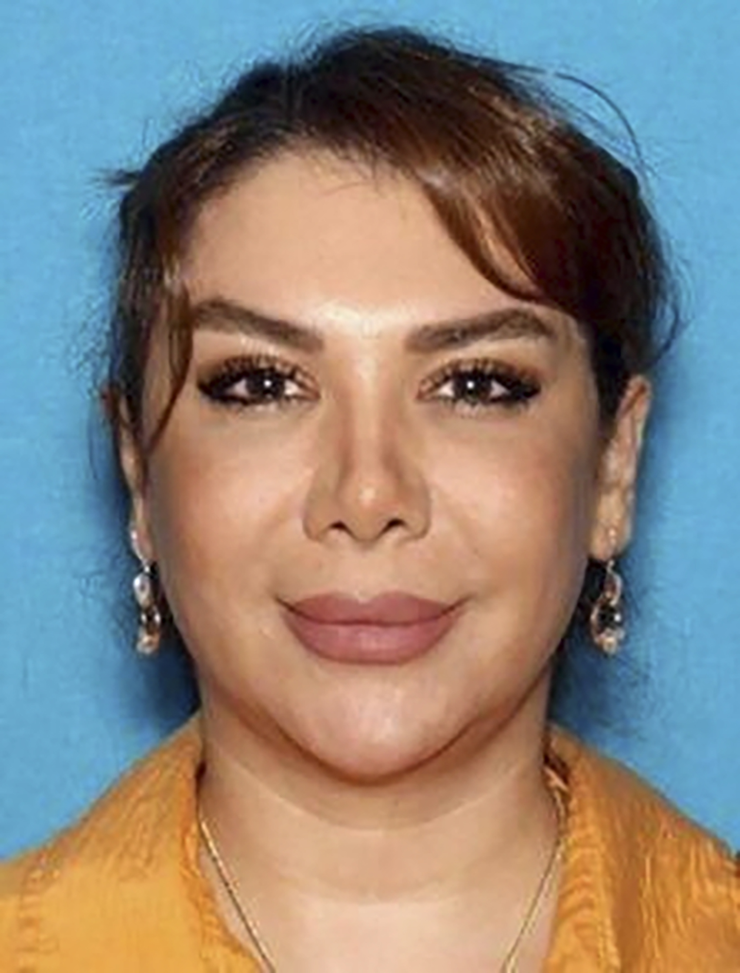 This undated driver's license photo provided by F.A. United States Attorney Bill Essayli shows Shamim Mafi. (F.A. United States Attorney Bill Essayli via AP)