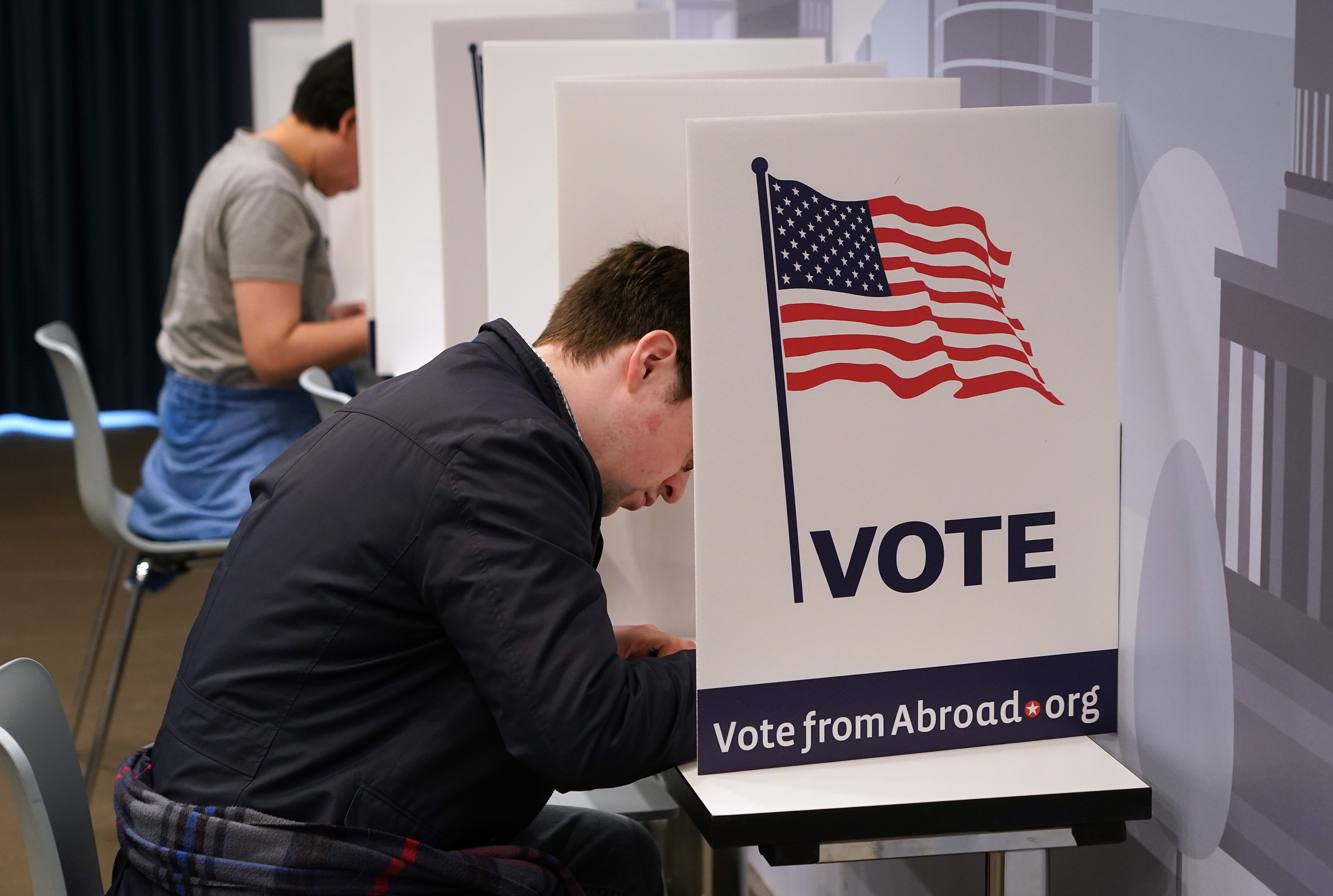 BERLIN, GERMANY - MARCH 08: U.S. expats fill out their ballots in U.S. Democratic primary elections at a polling station hosted by Democrats Abroad on March 08, 2020 in Berlin, Germany. Bernie Sanders and Joe Biden are facing off as the two top remaining Democratic candidates ahead of U.S. presidential elections scheduled for November. (Photo by Sean Gallup/Getty Images)