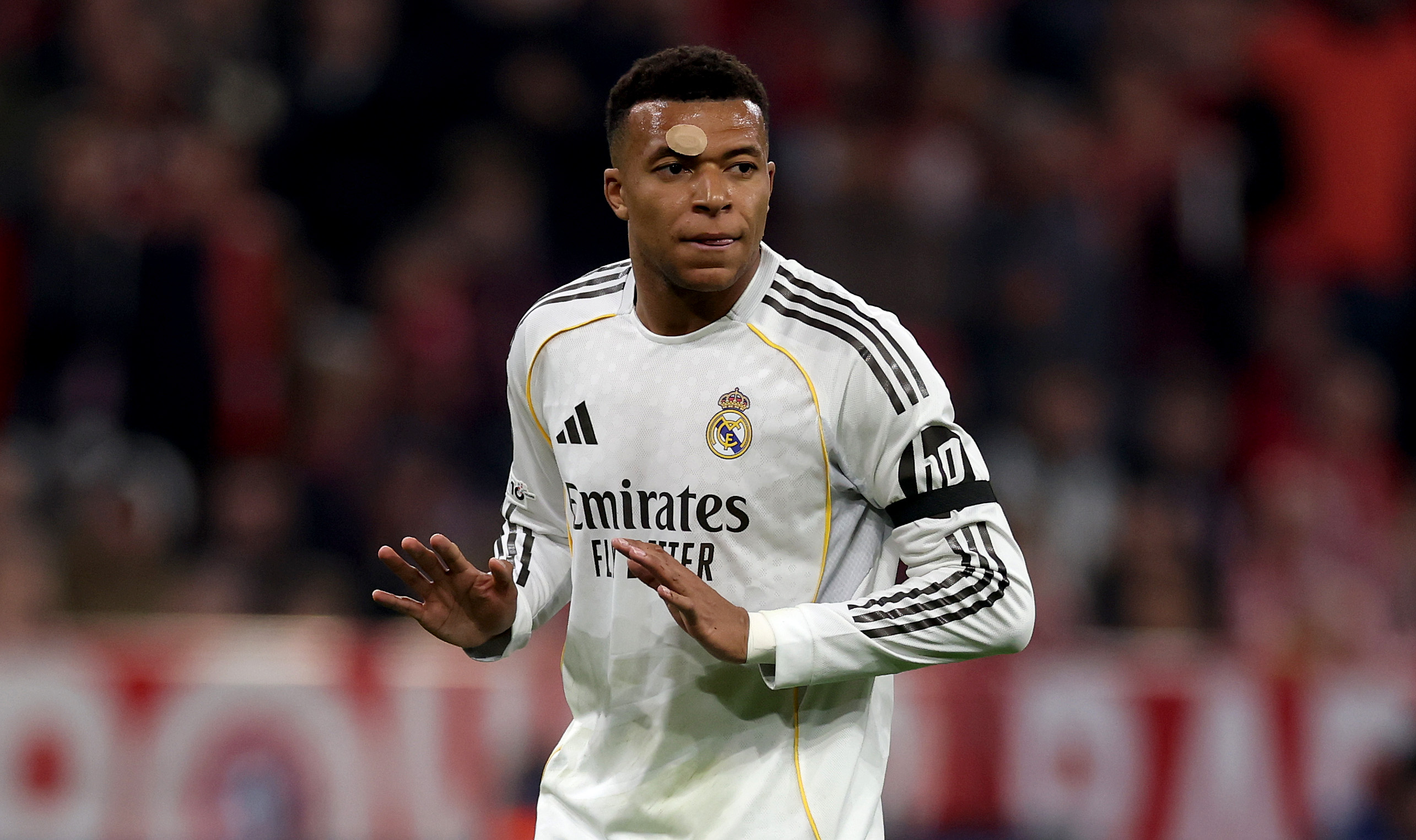 MUNICH, GERMANY - APRIL 15: Kylian Mbappe of Real Madrid looks on during the UEFA Champions League 2025/26 Quarter-Final Second Leg match between FC Bayern München and Real Madrid CF at Football Arena Munich on April 15, 2026 in Munich, Germany. (Photo by Lars Baron/Getty Images)