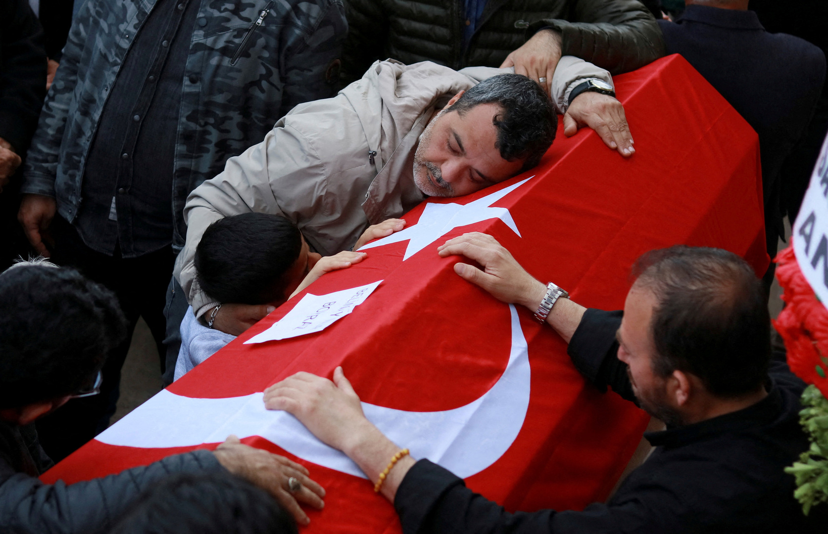Relatives of the victims of a school shooting mourn before their funeral prayers at a mosque in Kahramanmaras, Turkey on April 16, 2026. [Ensar Ozdemir/Reuters]