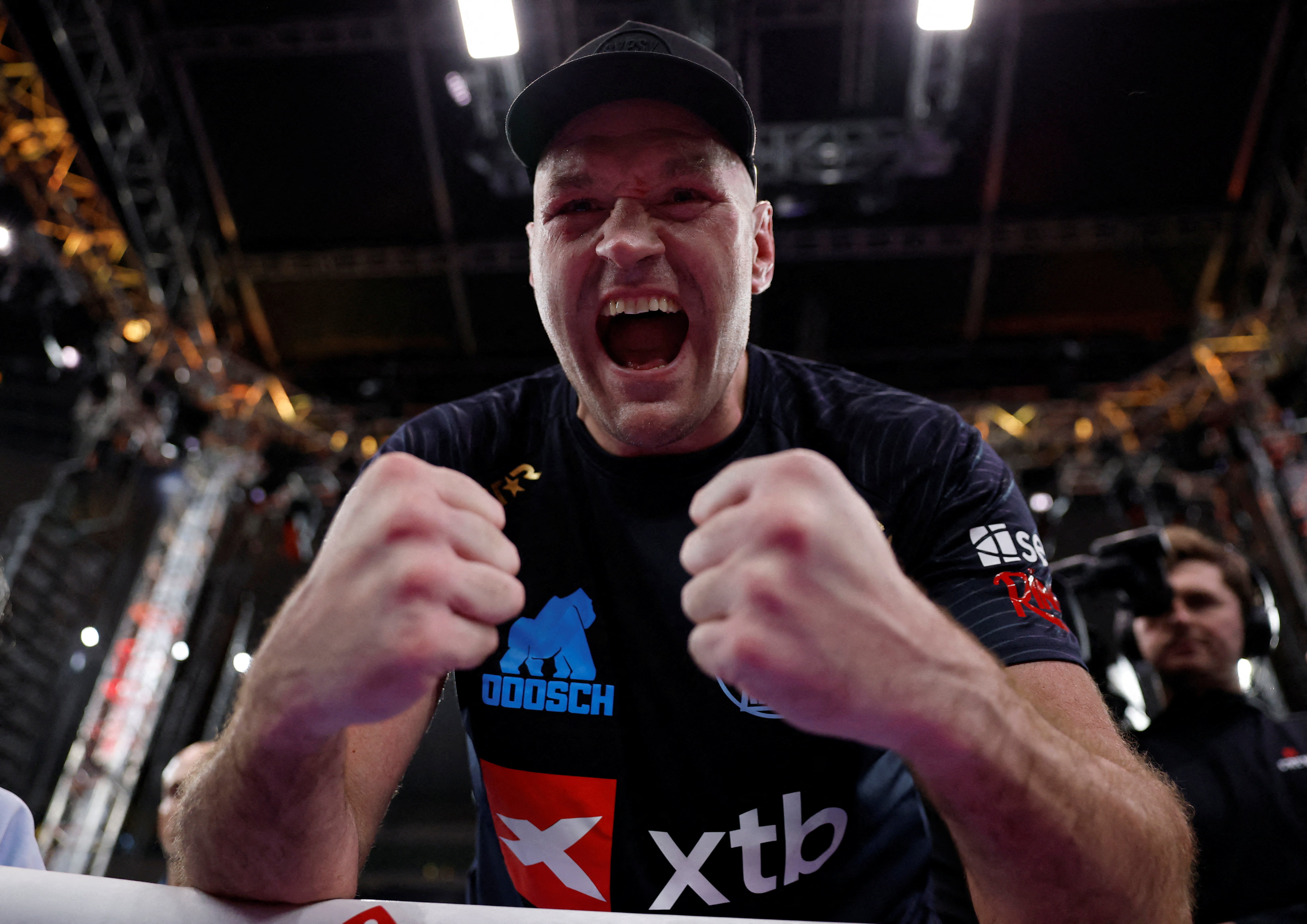 Tyson Fury celebrates winning his fight against Arslanbek Makhmudov