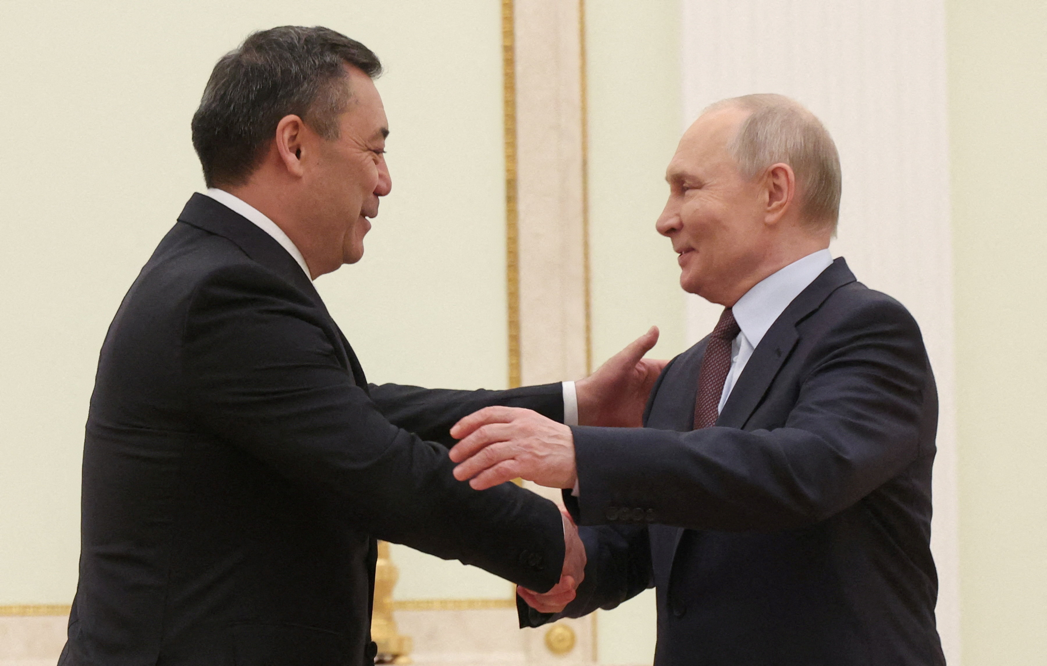 Russian President Vladimir Putin welcomes Kyrgyz President Sadyr Japarov during their meeting at the Kremlin in Moscow, Russia April 23, 2026. Maxim Shipenkov/Pool via REUTERS TPX IMAGES OF THE DAY