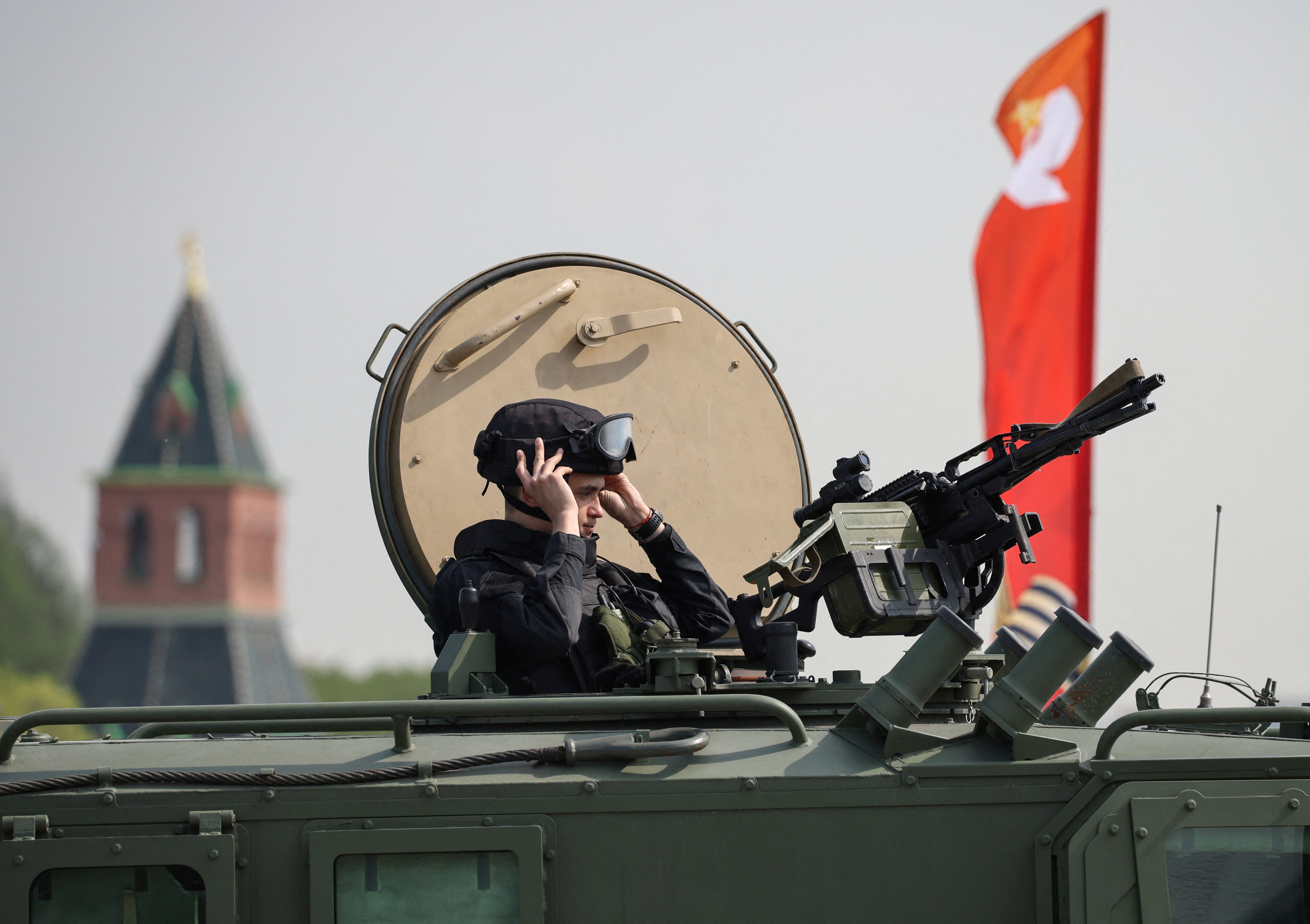A Russian security officer remains atop an all-terrain infantry mobility vehicle amid increased security measures taken ahead of Victory Day, marking the anniversary of victory over Nazi Germany in World War Two, near the Kremlin in central Moscow, Russia, May 7, 2026. REUTERS/Stringer