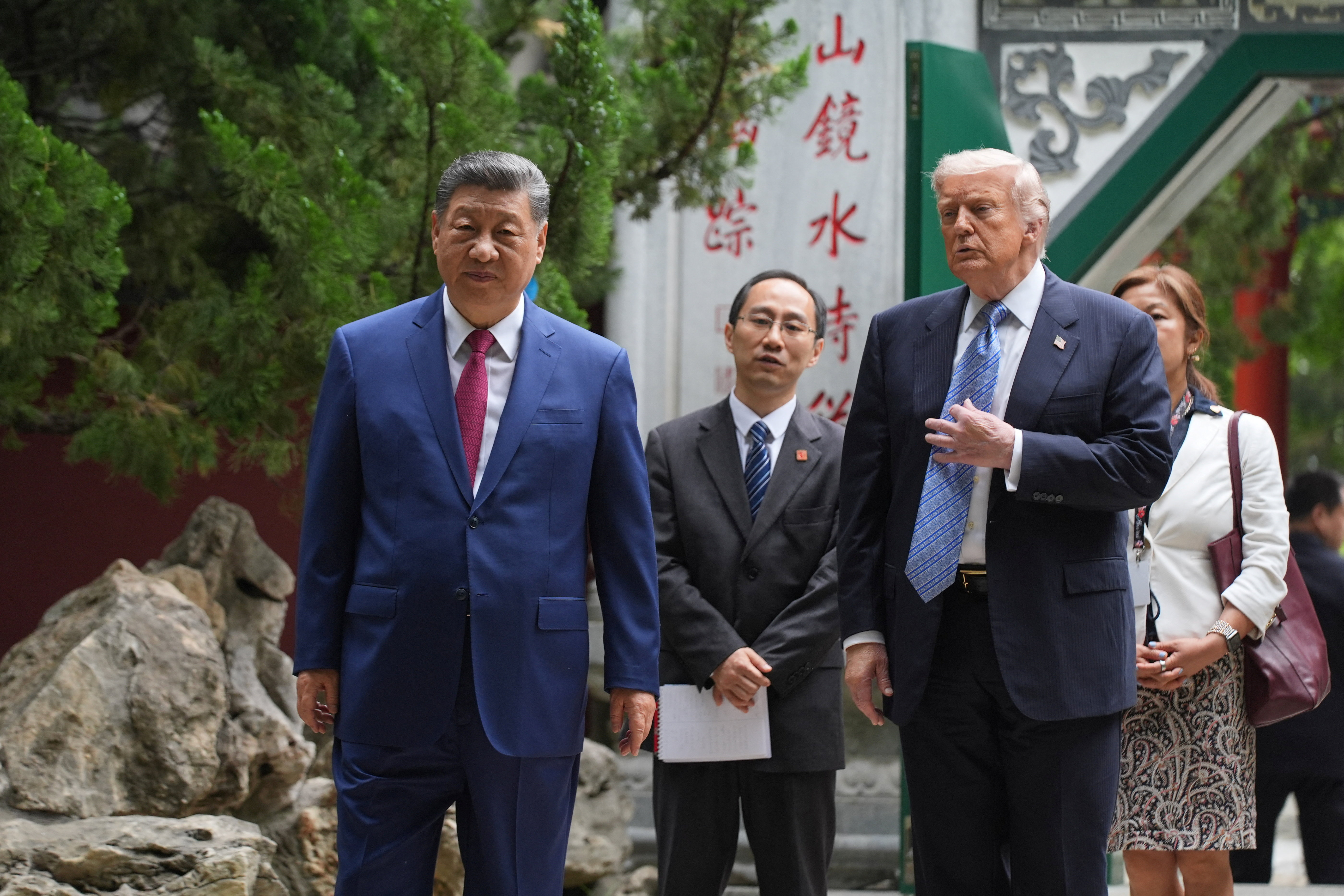 President Donald Trump talks with China’s President Xi Jinping.