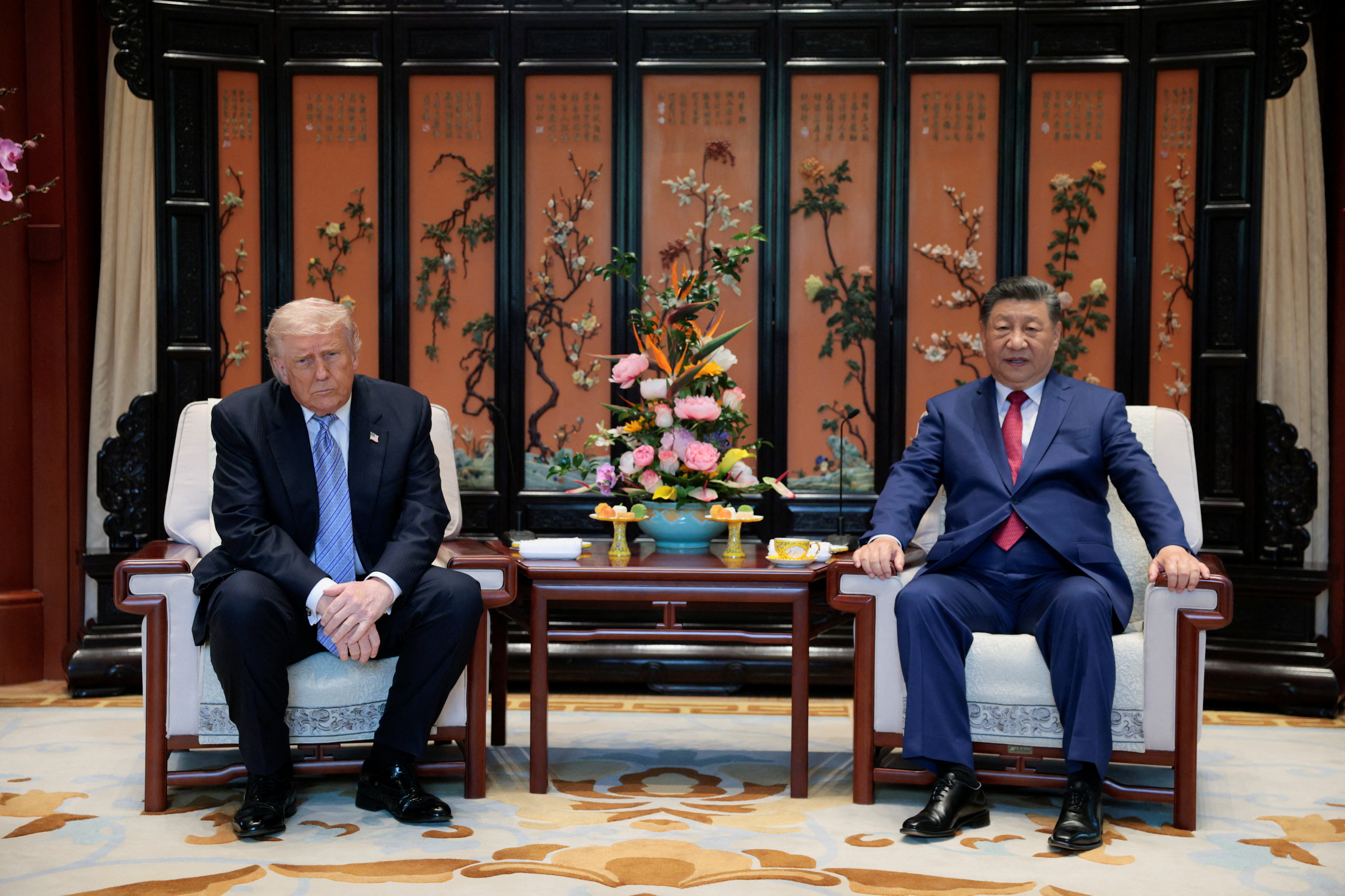 Chinese President Xi Jinping and U.S. President Donald Trump attend a meeting on the sidelines of their visit to the Zhongnanhai Garden in Beijing, China, May 15, 2026. REUTERS/Evan Vucci/Pool