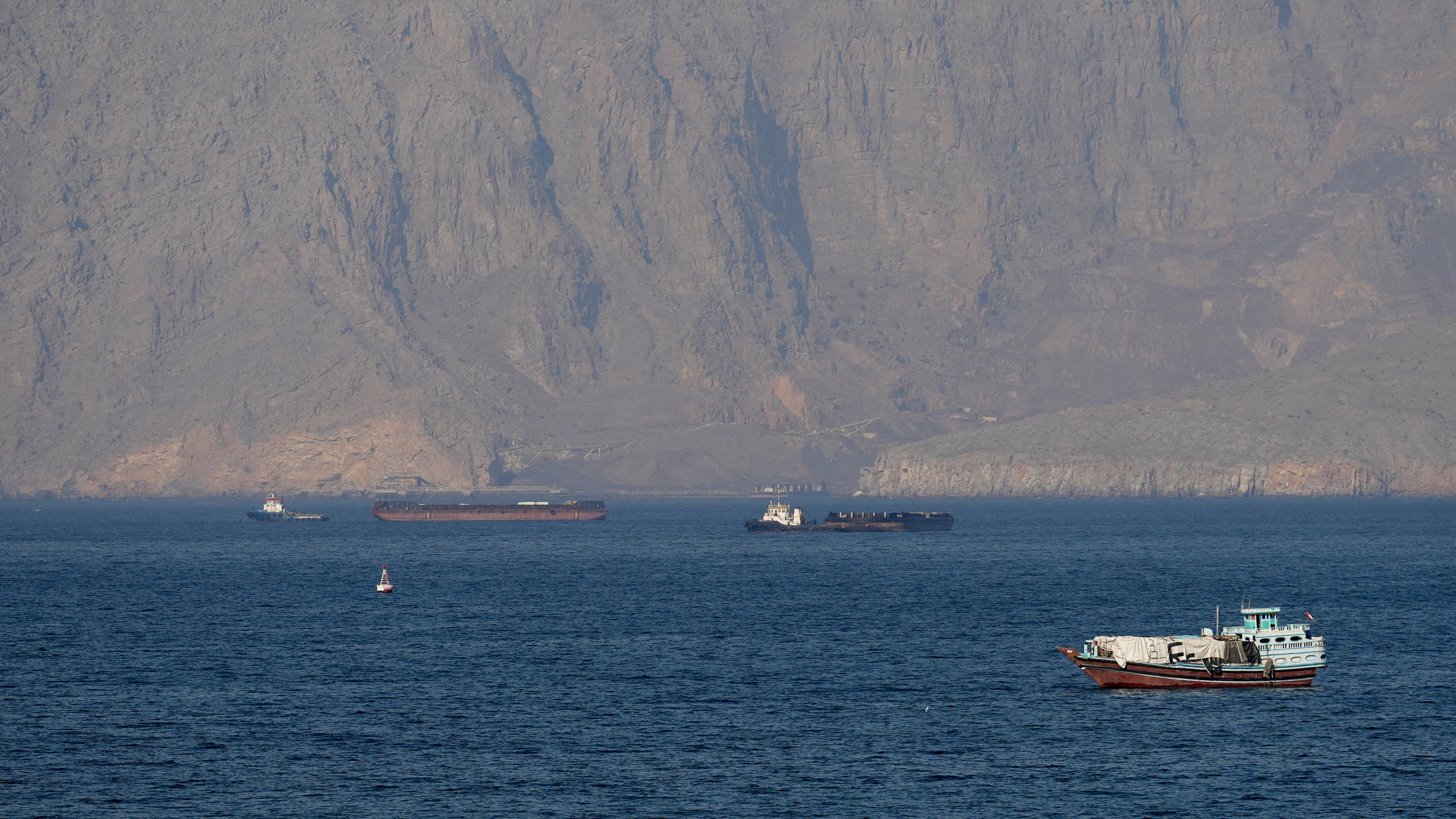 FILE PHOTO: Ships and tankers in the Strait of Hormuz off the coast of Musandam, Oman, April 18, 2026. REUTERS/Stringer/File Photo