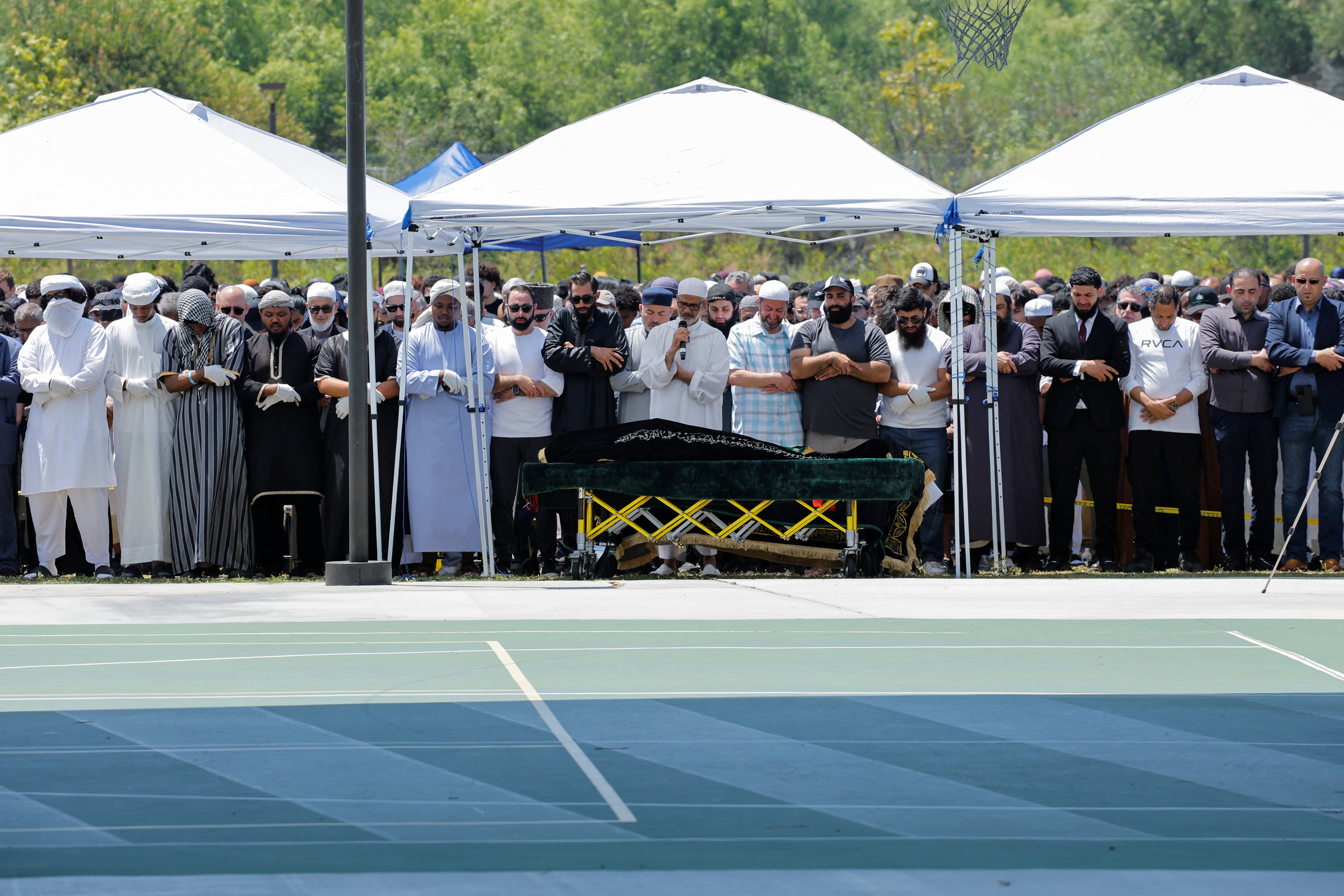 Imam Taha Hassane attends a prayer service for the victims of a shooting at the Islamic Center, in San Diego,