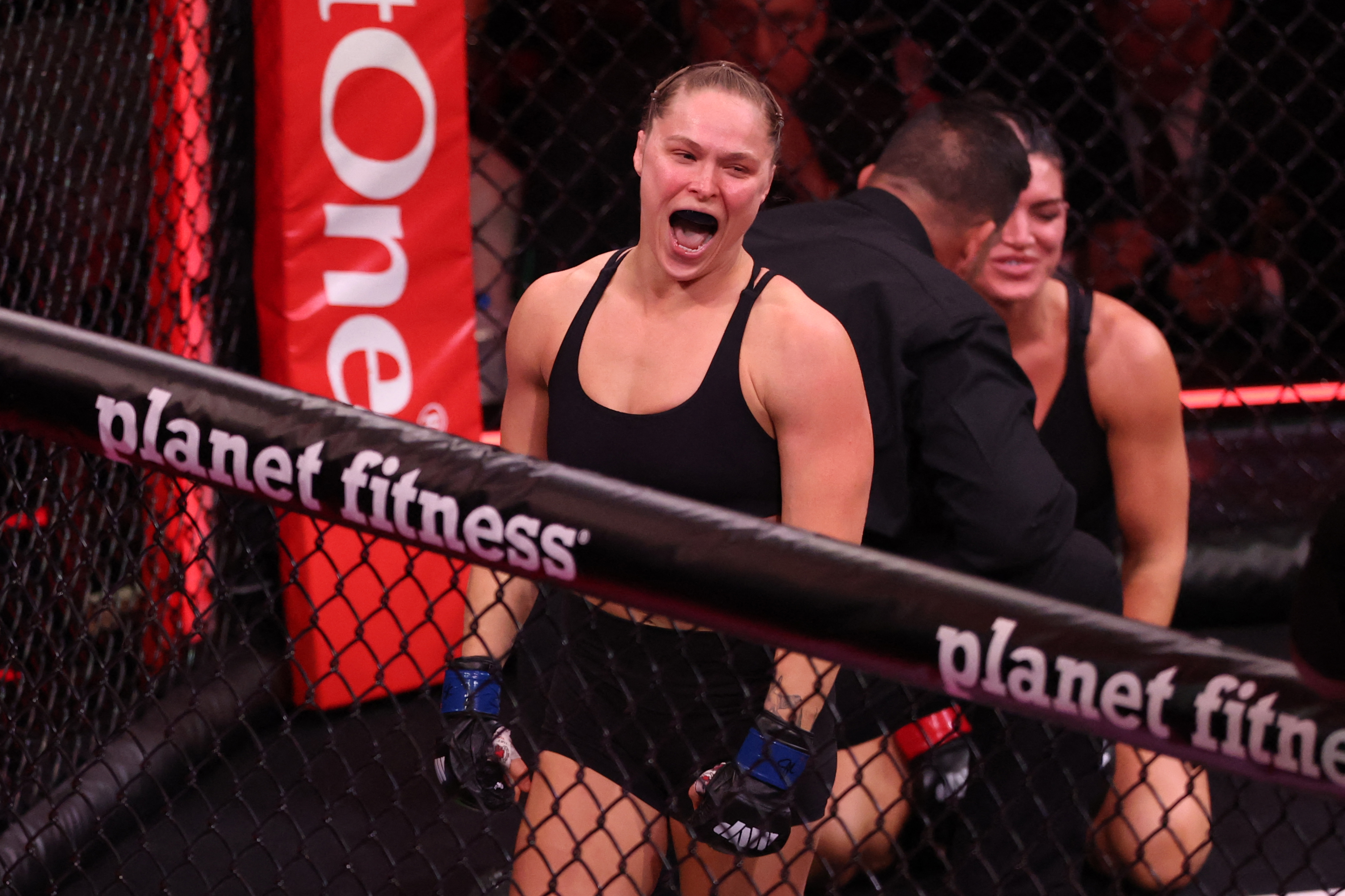 US Mixed Martial Arts (MMA) fighter Ronda Rousey reacts after defeating Gina Carano during their Featherweight Bout at the Intuit Dome in Inglewood, California, on May 16, 2026. (Photo by Patrick T. Fallon / AFP)