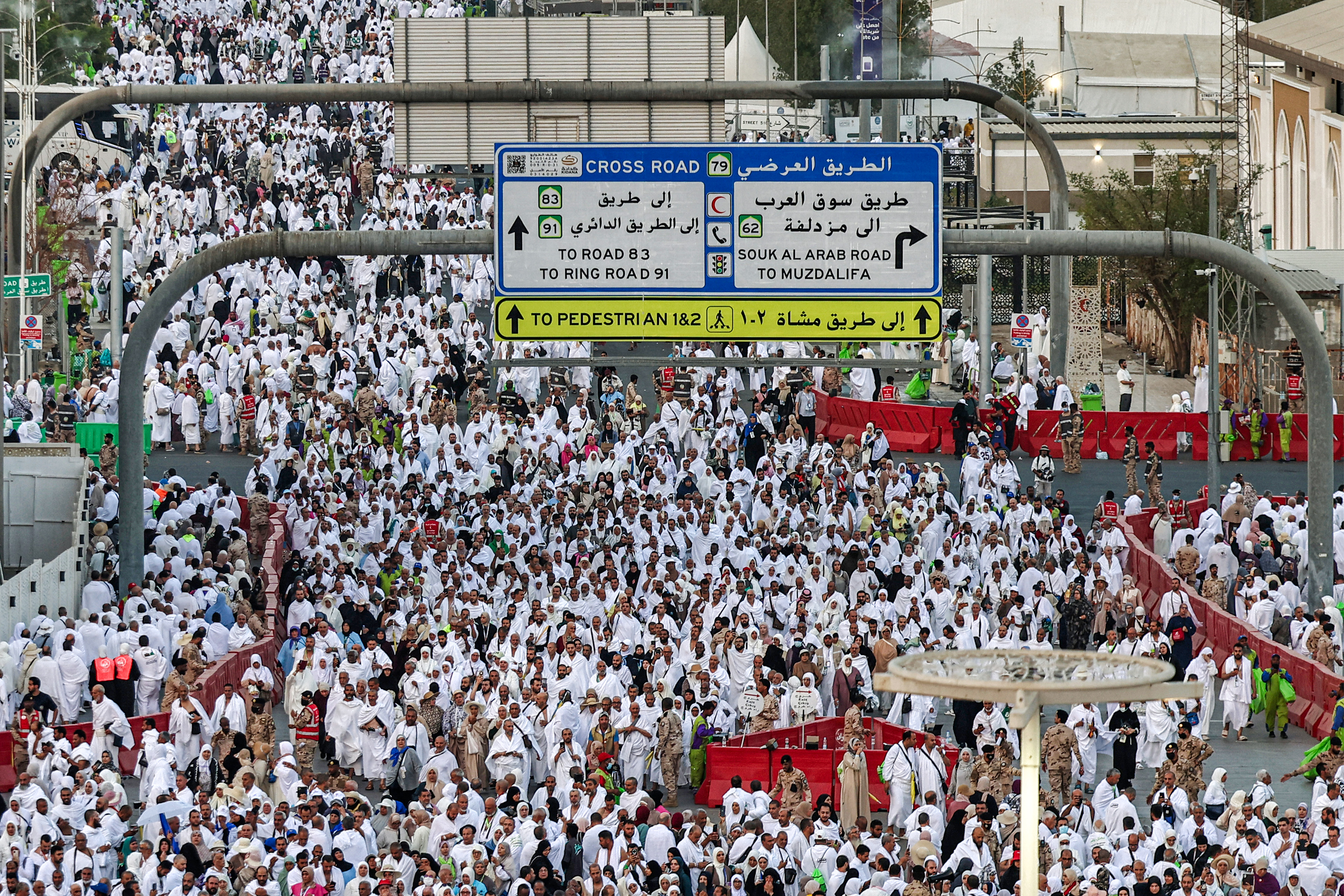 Hajj pilgrims gather at Mount Arafat under scorching desert sun
