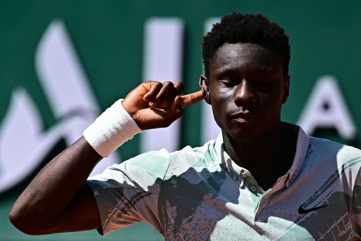 France's Moise Kouame reacts as he plays against Croatia's Marin Cilic during their men's singles match on day 3 of the French Open tennis tournament on Court Simonne-Mathieu at the Roland-Garros