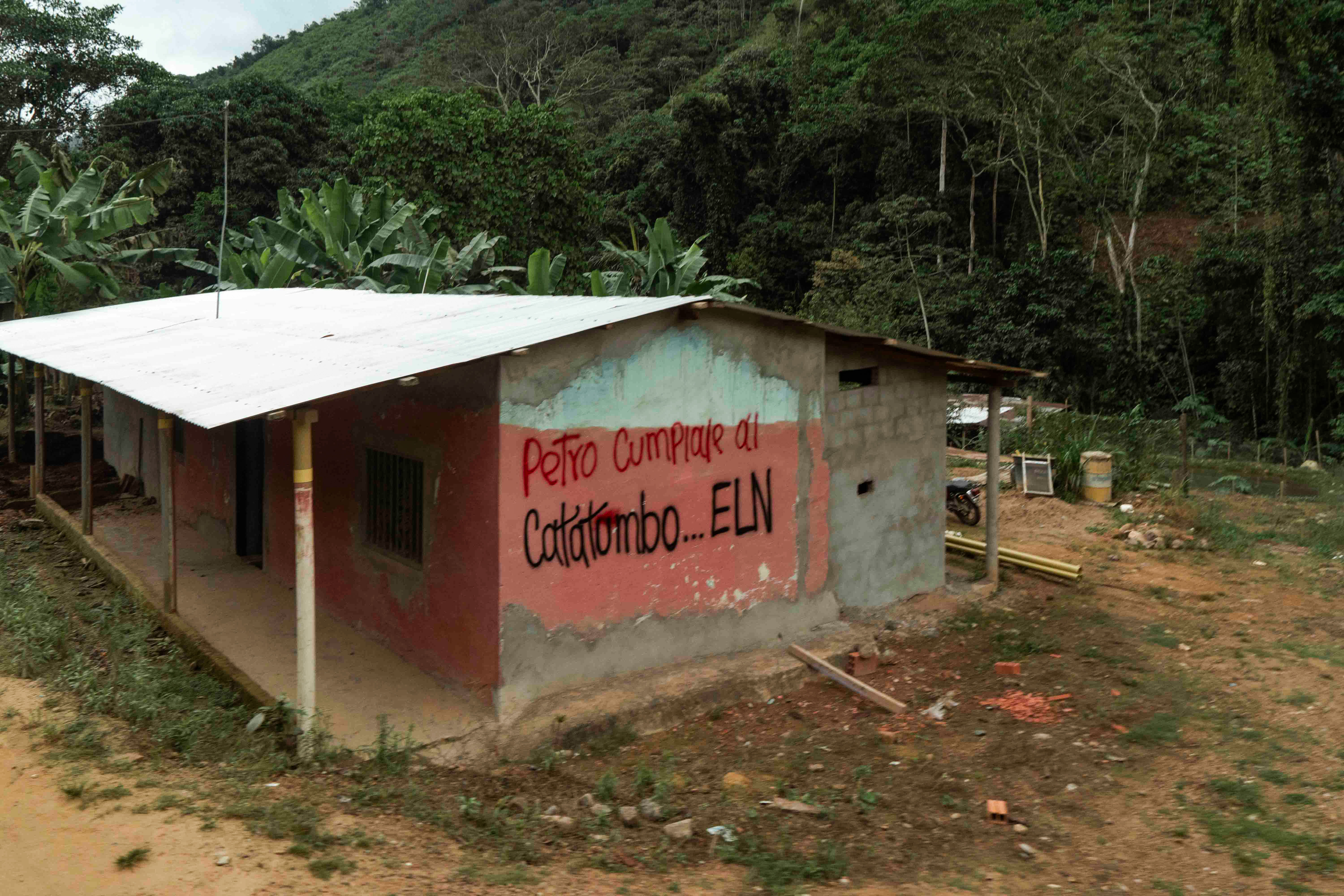 A building with ELN spraypainted on the side