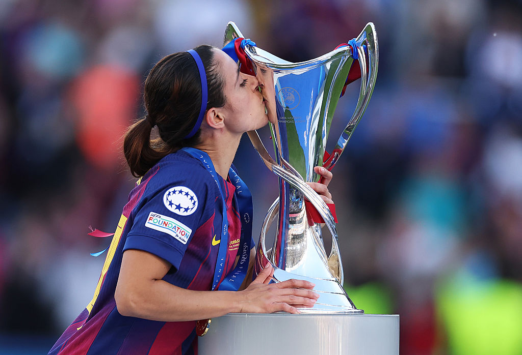 Aitana Bonmati of FC Barcelona kisses the the UEFA Women's Champions League Trophy following the team's victory during the UEFA Women's Champions League Final 2026 match between FC Barcelona and OL Lyon