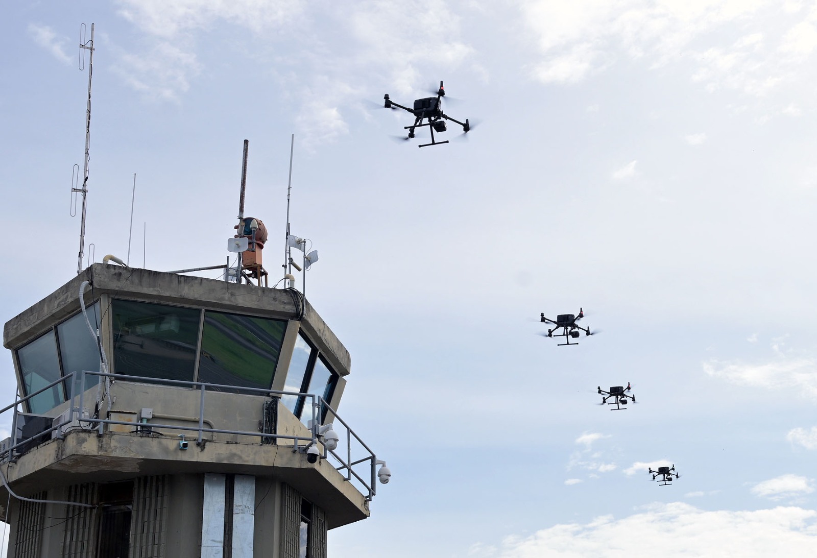 a column of drones in the sky