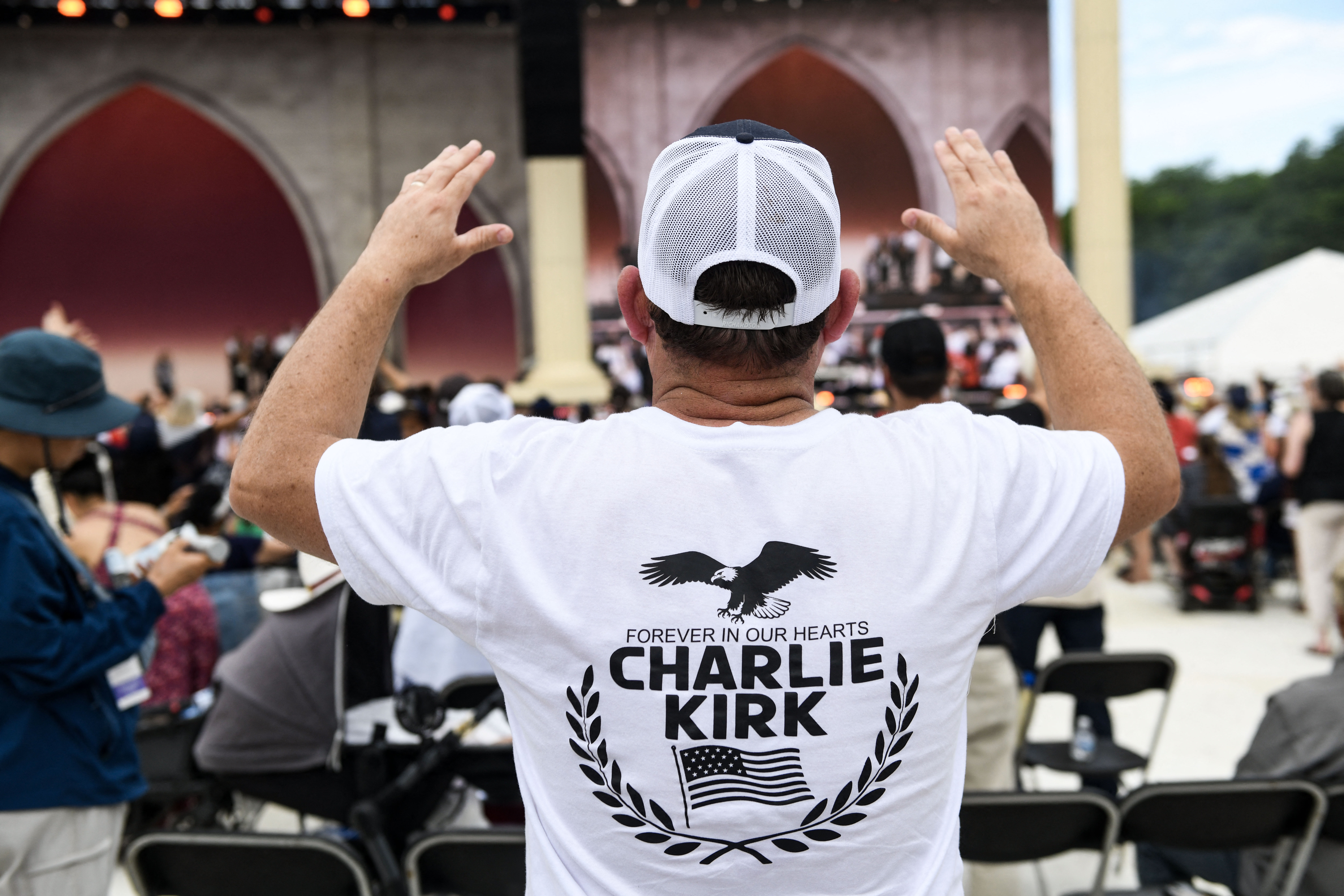 Attendees pray and celebrate during "Rededicate 250: A National Jubilee of Prayer, Praise and Thanksgiving" on the National Mall in Washington, DC, on May 17, 2026.