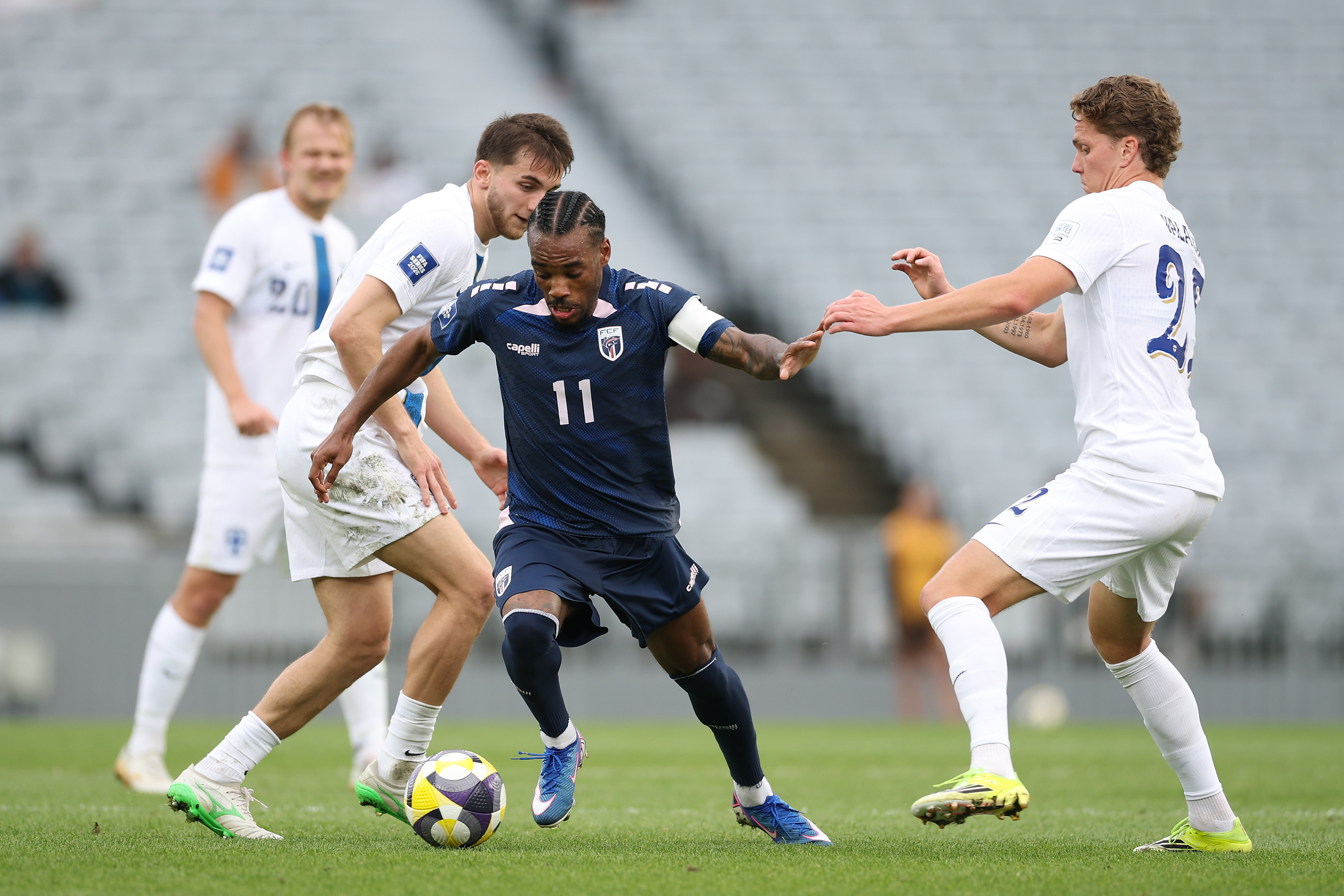 AUCKLAND, NEW ZEALAND - MARCH 30: Garry Rodrigues of Cape Verde is challenged by Onni Valakari of Finland during the FIFA Series match between Cape Verde and Finland at Eden Park on March 30, 2026 in Auckland, New Zealand. (Photo by Phil Walter/Getty Images)