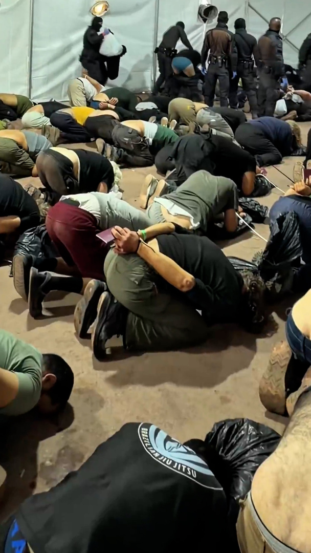 The video released by Ben-Gvir on Wednesday shows activists from a Gaza-bound aid flotilla bound and kneeling on the ground [Screengrab/Al Jazeera]