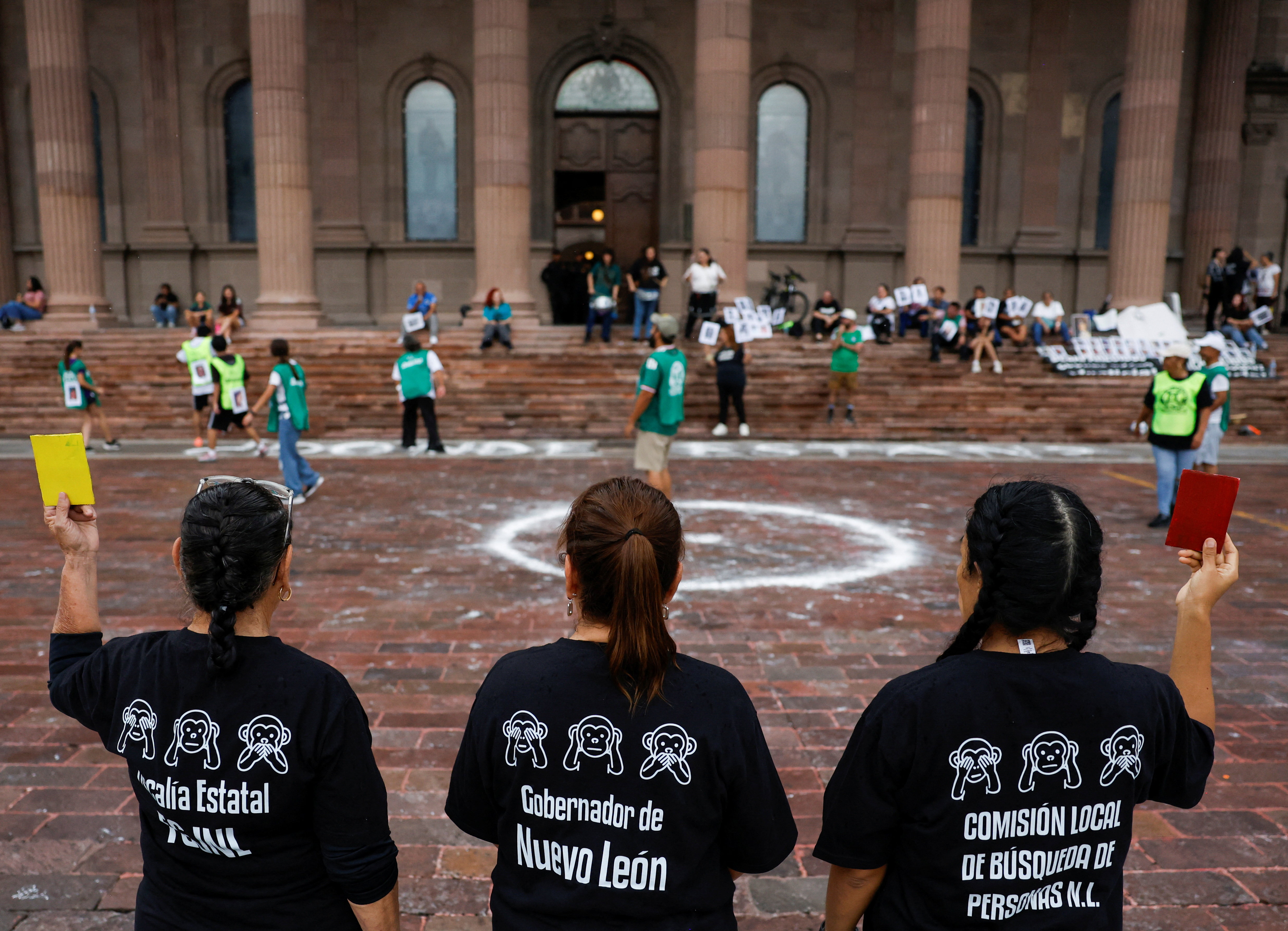 Members of the missing persons search collective United Forces for Our Disappeared in Nuevo Leon (FUNDENL), play soccer in memory of the missing ahead of the FIFA 2026 World Cup, in front of the Government Palace of Nuevo Leon, in Monterrey, Mexico, May 17, 2026. REUTERS/Daniel Becerril
