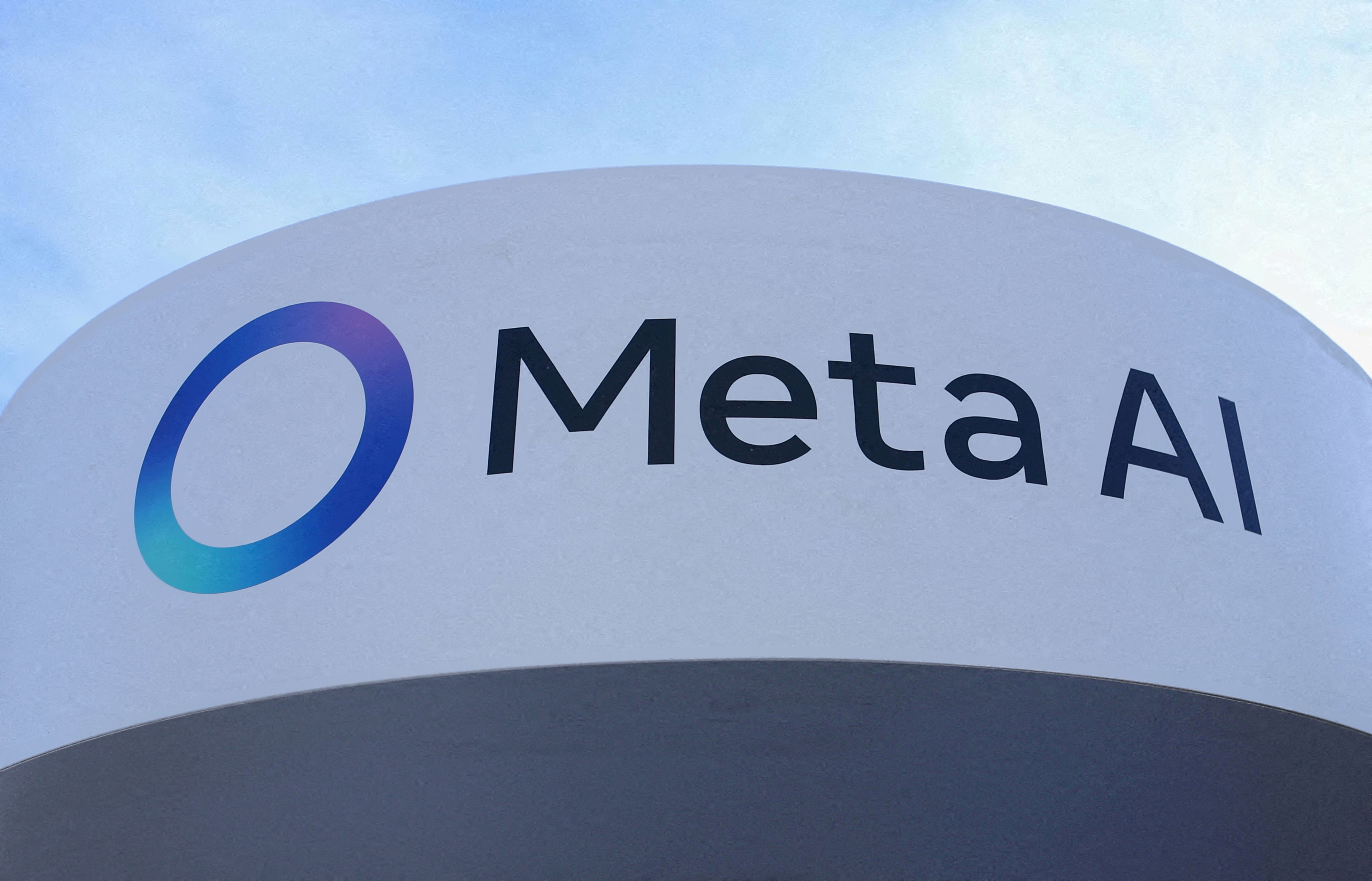 FILE PHOTO: A logo of Meta AI sits outside the Meta House on the opening day of the 55th annual meeting of the World Economic Forum in Davos, Switzerland, January 20, 2025. REUTERS/Yves Herman//File Photo/File Photo