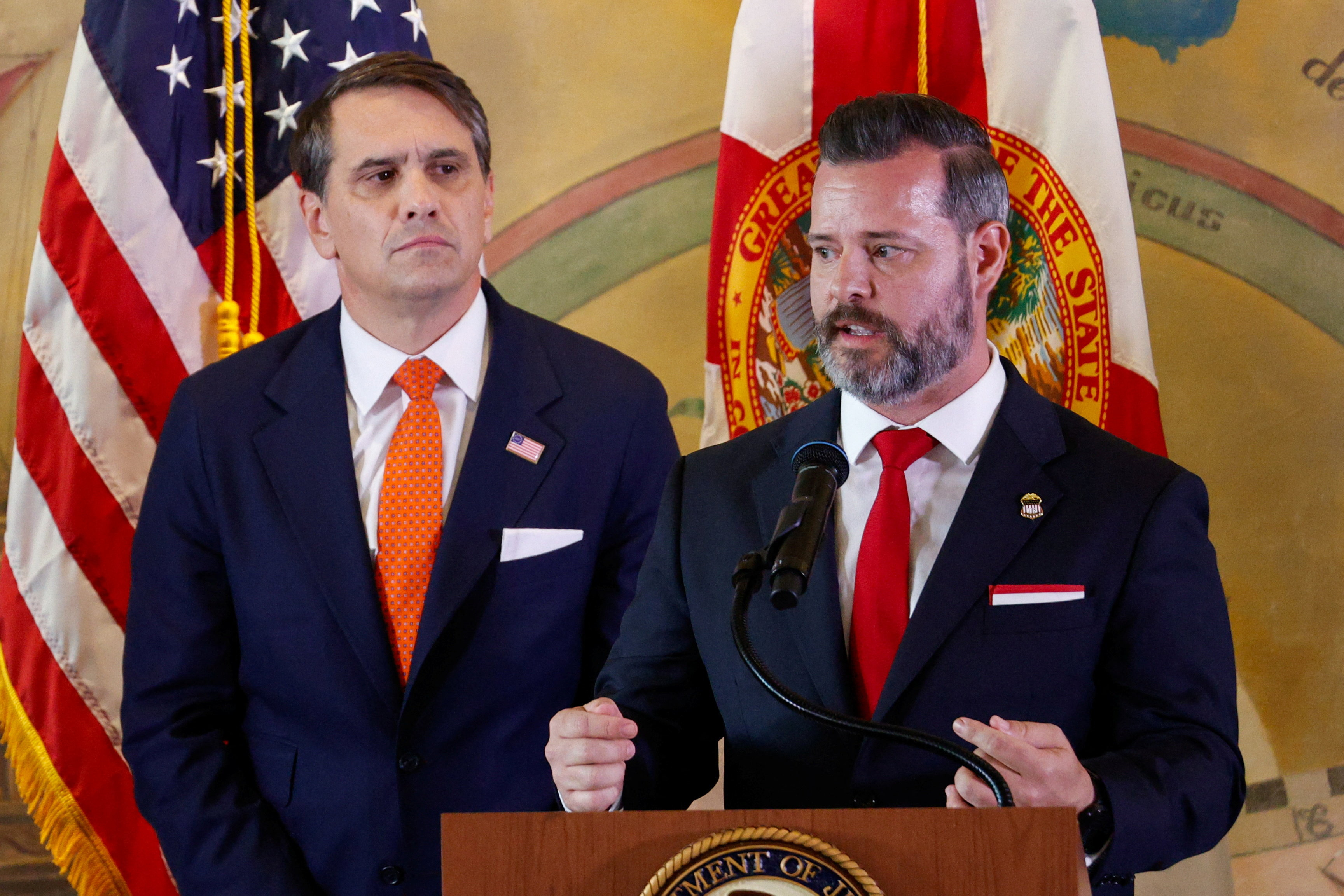 U.S. Attorney for the Southern District of Florida, Jason A. Reding Quinones speaks, while with Acting U.S. Attorney General, Todd Blanche, as the U.S. Department of Justice announces criminal charges against former Cuban President Raul Castro, during a ceremony to honor the victims of the 1996 shootdown of Brothers to the Rescue aircraft incident, at Freedom Tower in Miami, Florida, U.S., May 20, 2026. REUTERS/Marco Bello