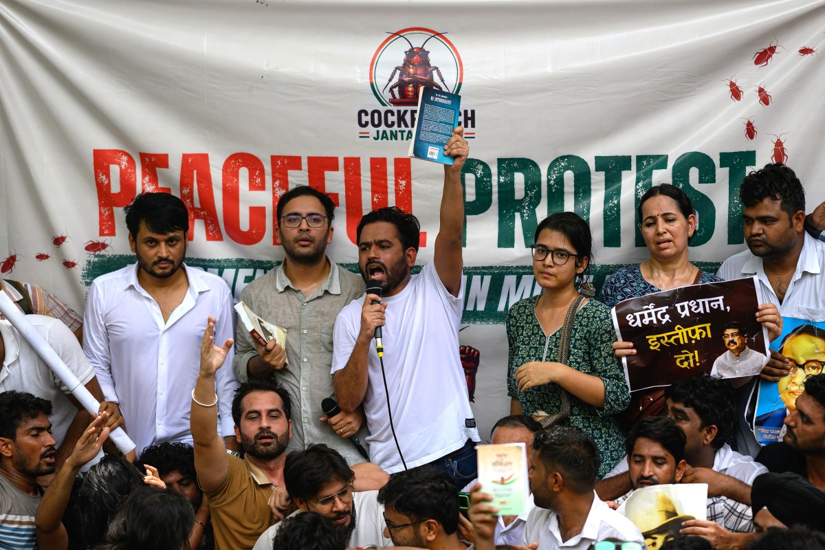 Cockroach Janta Party founder Abhijeet Dipke, centre, speaks during a protest over alleged irregularities in the country’s major examinations, in New Delhi, India, June 6, 2026
