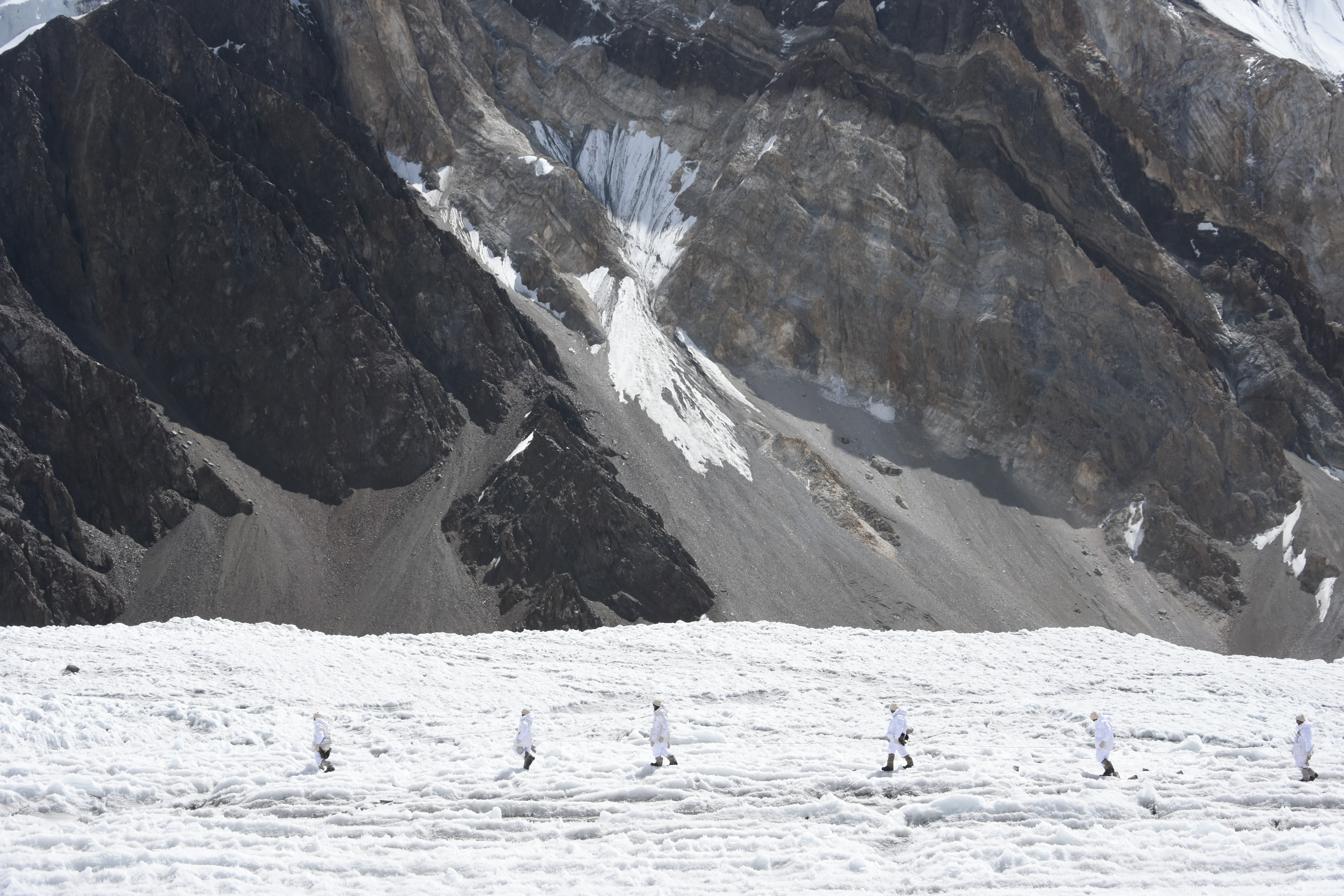 SIACHEN, PAKISTAN- SEPTEMBER 16: Pakistani soldiers patrol where India and Pakistan both claim the area and have thousands of soldiers stationed there in Siachen, Pakistan on September 16, 2019. At a height of up to 8,000 meters, Siachen is regarded as the world's highest battlefield due to military conflict between India and Pakistan which was started in 1984. Military life in the region is viewed by Anadolu Agency for the first time in international media.