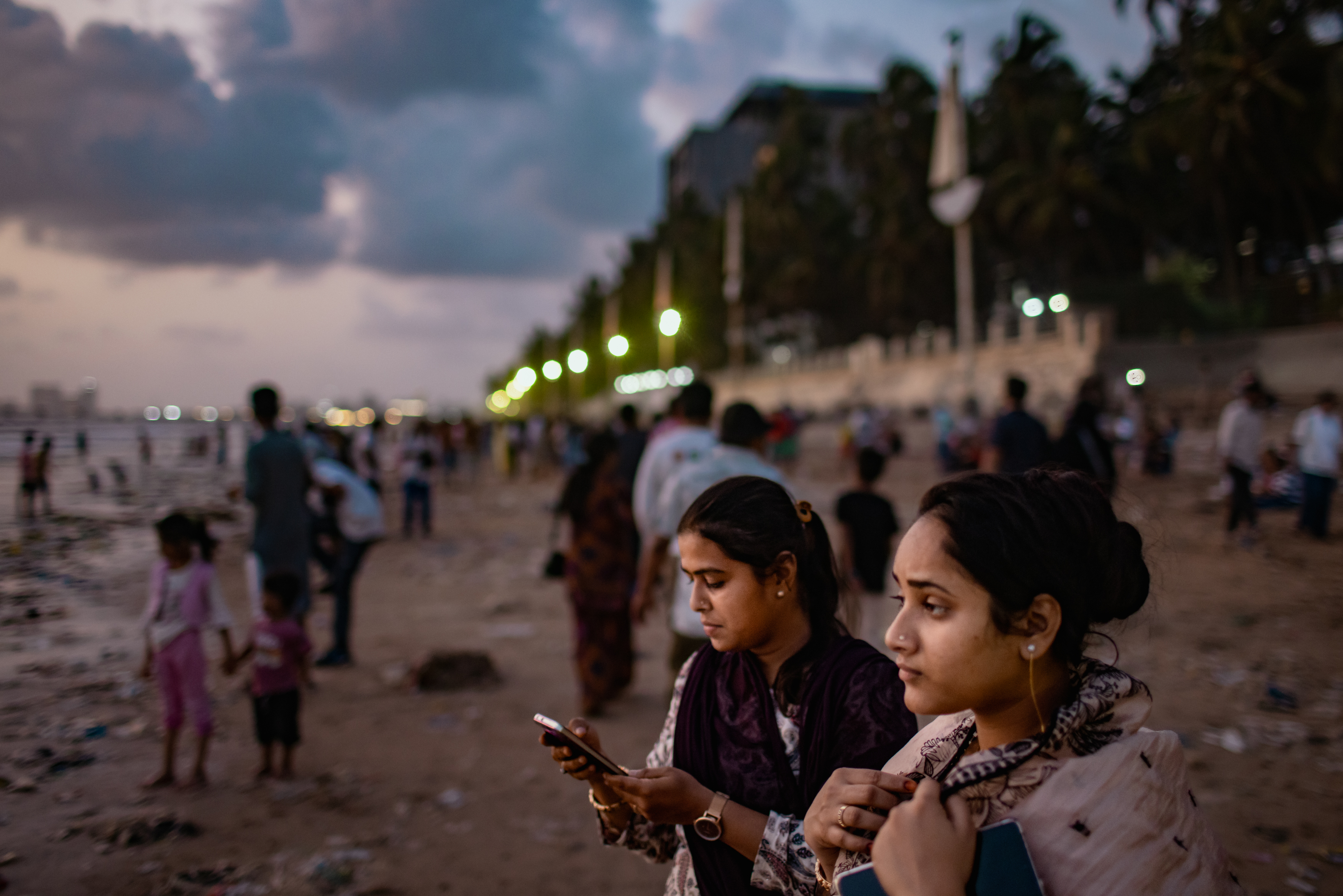 MUMBAI, INDIA - JUNE 13: Students enjoy a day at the beach during their summer vacation on June 13, 2026 in Mumbai, India. Juhu Beach faces a severe plastic waste crisis. Millions of visitors, combined with the widespread use of single-use plastics, generate large amounts of litter along the shoreline. During the monsoon season, ocean currents wash ashore vast quantities of marine debris, with up to 1.5 lakh kilograms (150,000 kg) of waste accumulating on the beach each day. (Photo by Elke Scholiers/Getty Images)