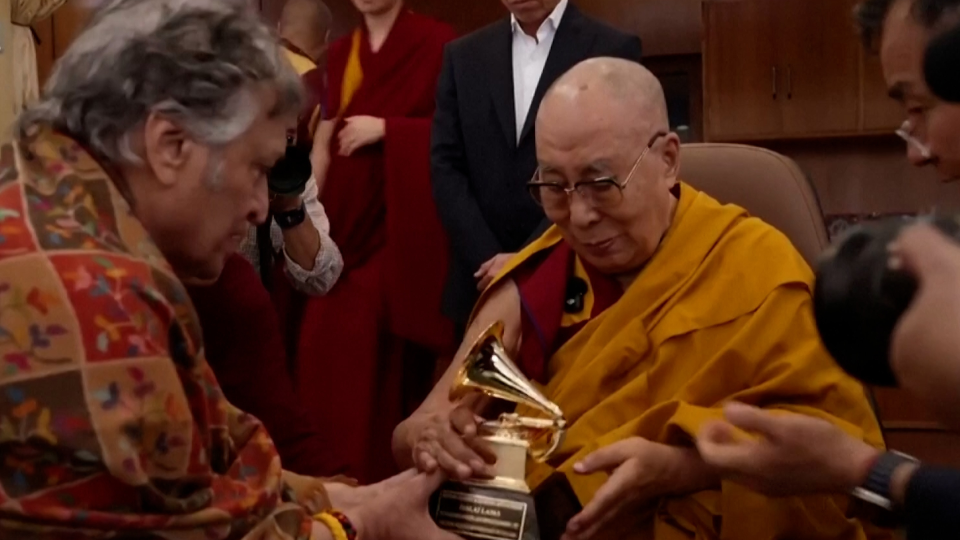 Dalai Lama receives Grammy award at India residence [Reuters]