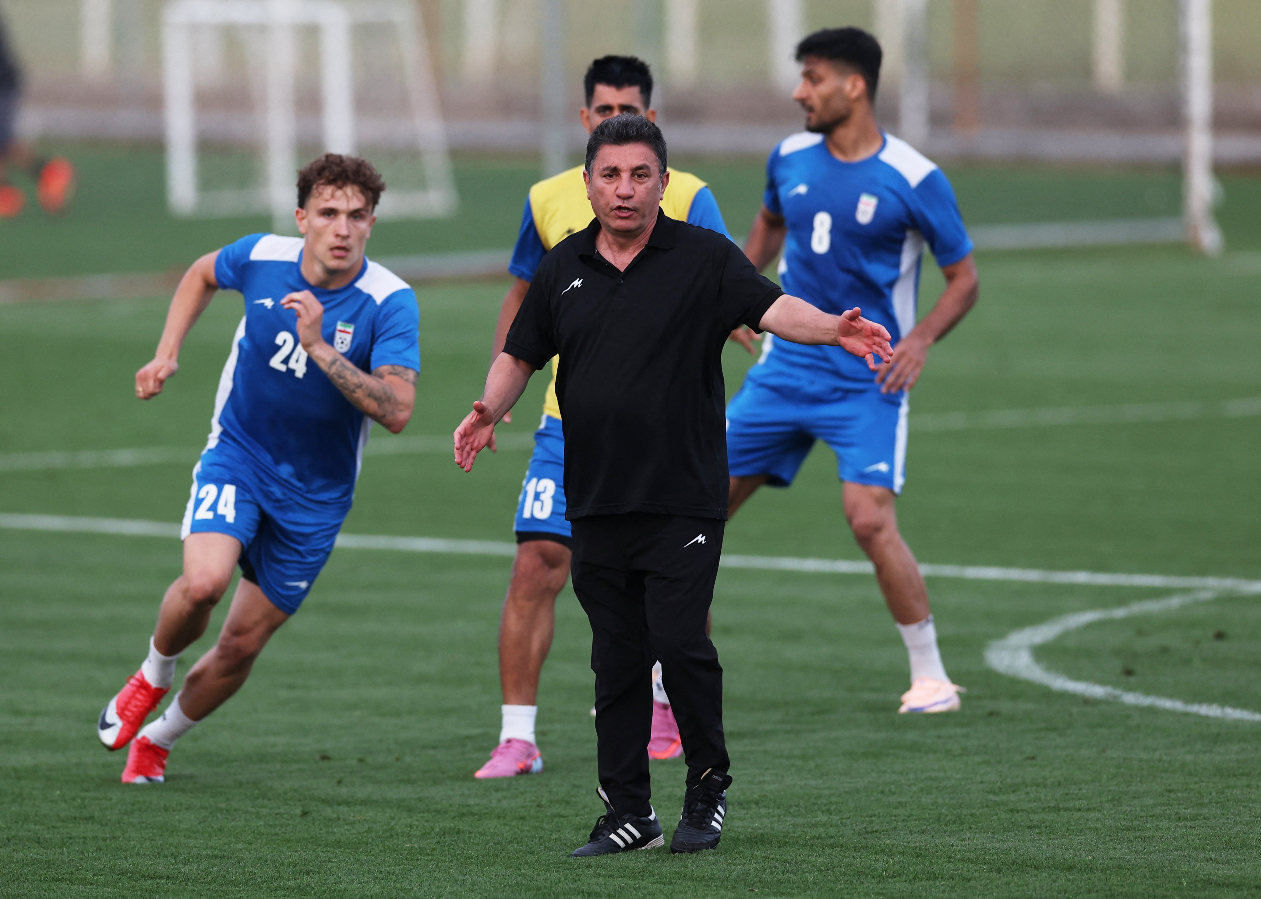 Soccer Football - International Friendly - Iran training - Titanic Deluxe Belek Football Center, Antalya, Turkey - May 28, 2026 Iran coach Amir Ghalenoei reacts alongside Iran's Dennis Eckert REUTERS/Umit Bektas