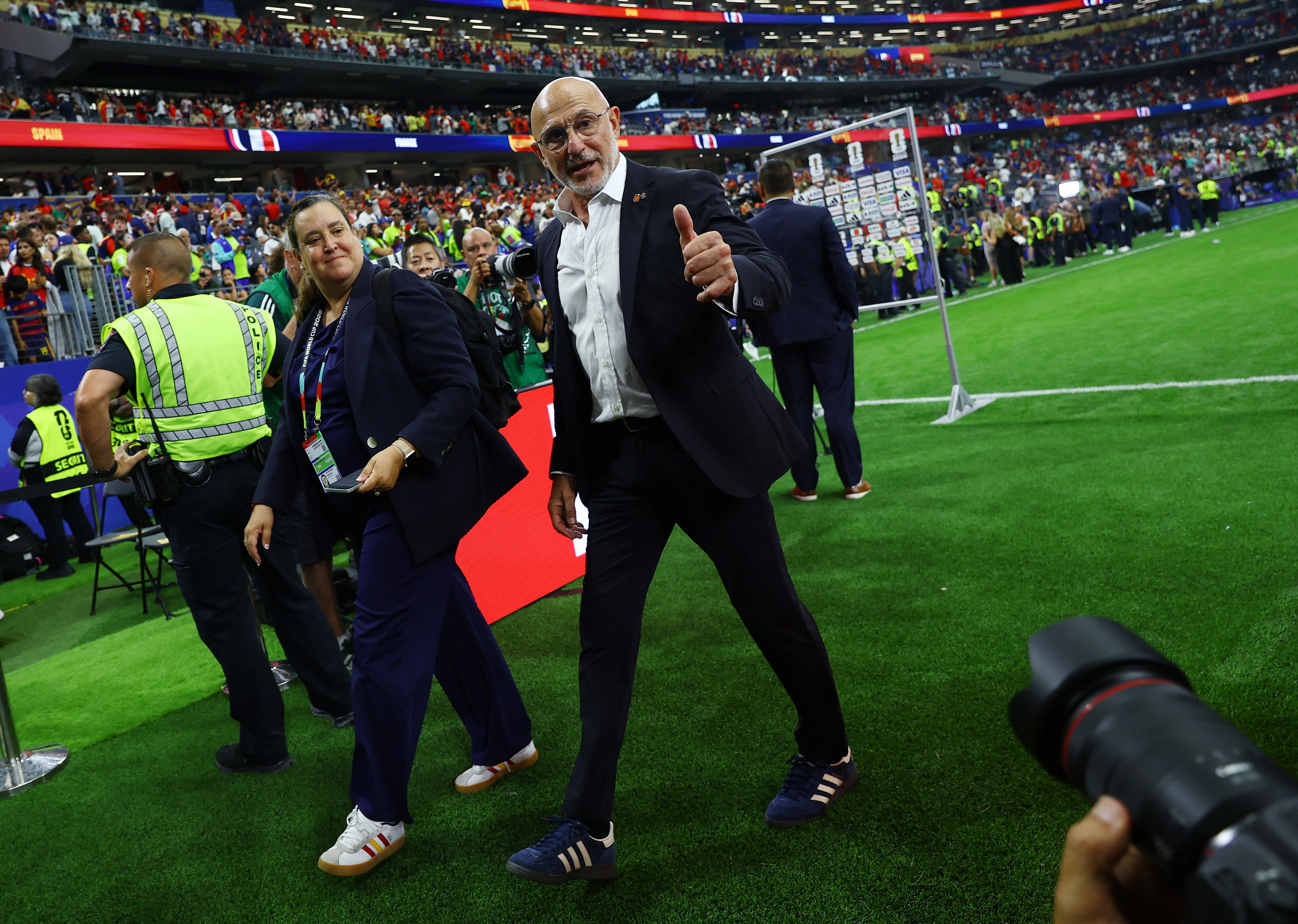 Spain coach Luis De La Fuente celebrates after the match as they advance to the World Cup final