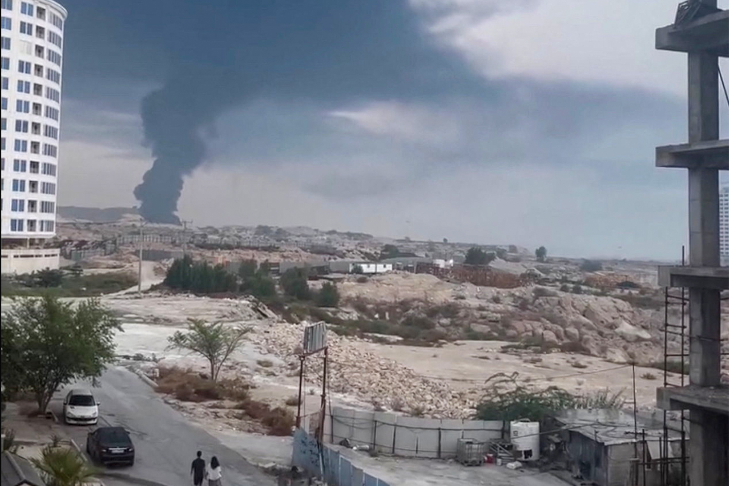 A plume of smoke rises after reported strikes, from Qeshm, Iran, July 30, 2026, in this screengrab obtained from a social media video. Social Media/via REUTERS THIS IMAGE HAS BEEN SUPPLIED BY A THIRD PARTY. NO RESALES. NO ARCHIVES. OVERLAY FROM SOURCE. NEWS USE ONLY.