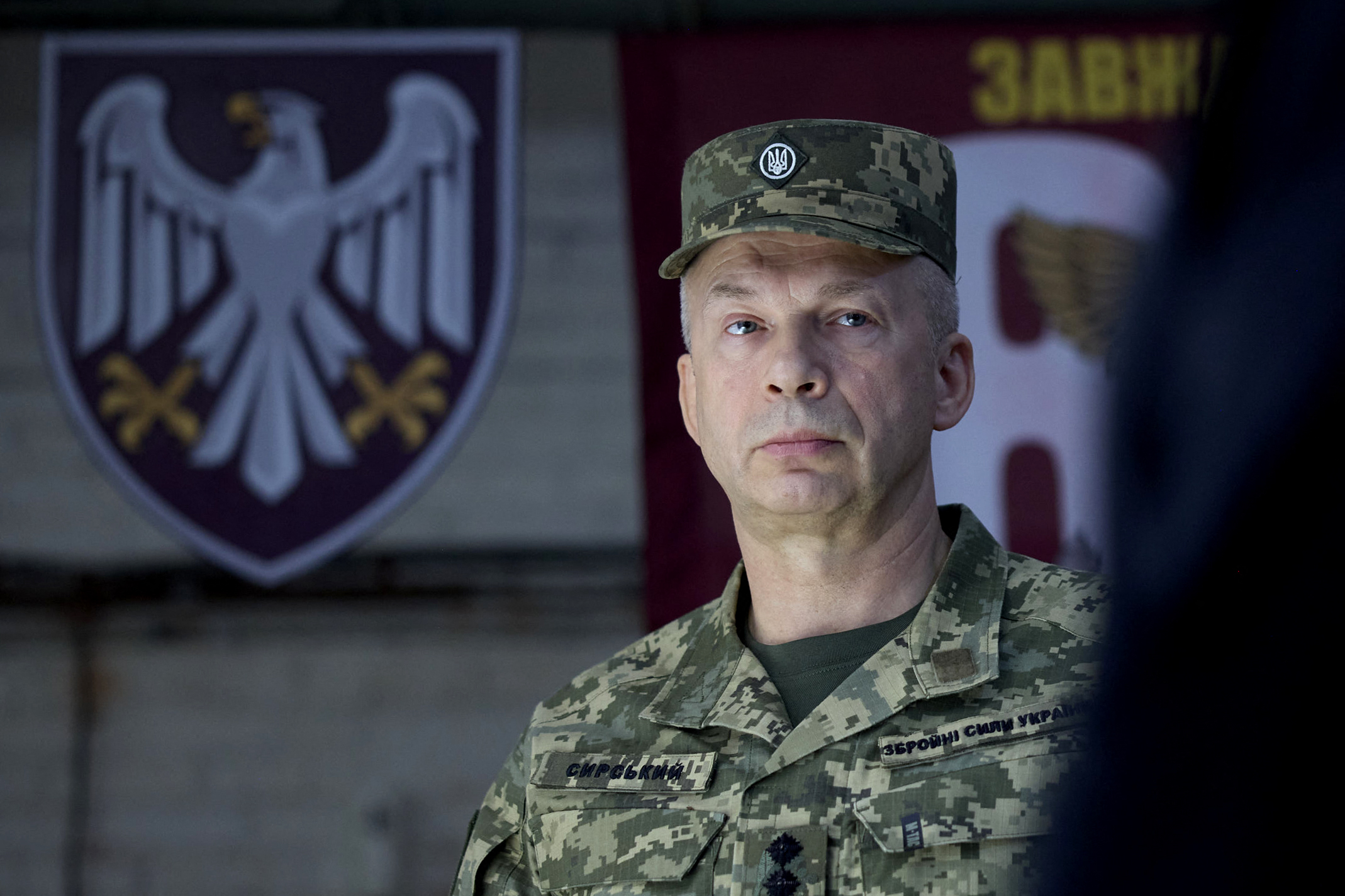 (FILES) This handout photograph taken and released by the Ukrainian Presidential Press Service on October 4, 2024, shows Commander-in-Chief of the Armed Forces of Ukraine Oleksandr Syrsky visiting the 82nd Air Assault Brigade at an undisclosed location in the Sumy region, amid the Russian invasion of Ukraine.