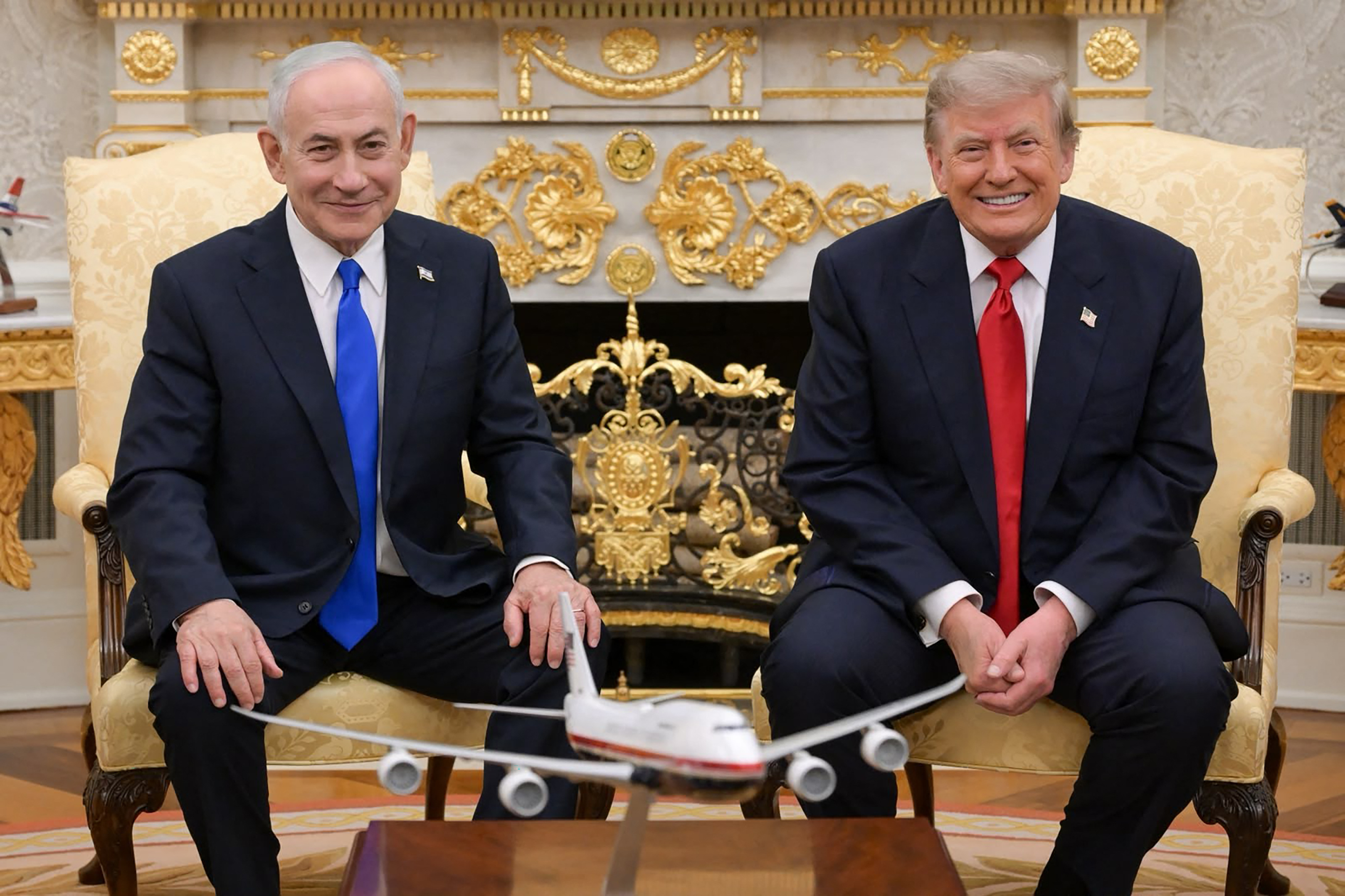 TOPSHOT - This handout picture released by the Israeli Government Press Office (GPO) Shows Israel's Prime Minister Benjamin Netanyahu (L) posing for a picture with US President Donald Trump in the Oval Office of the White House in Washington DC, ahead of their meeting on July 28, 2026.