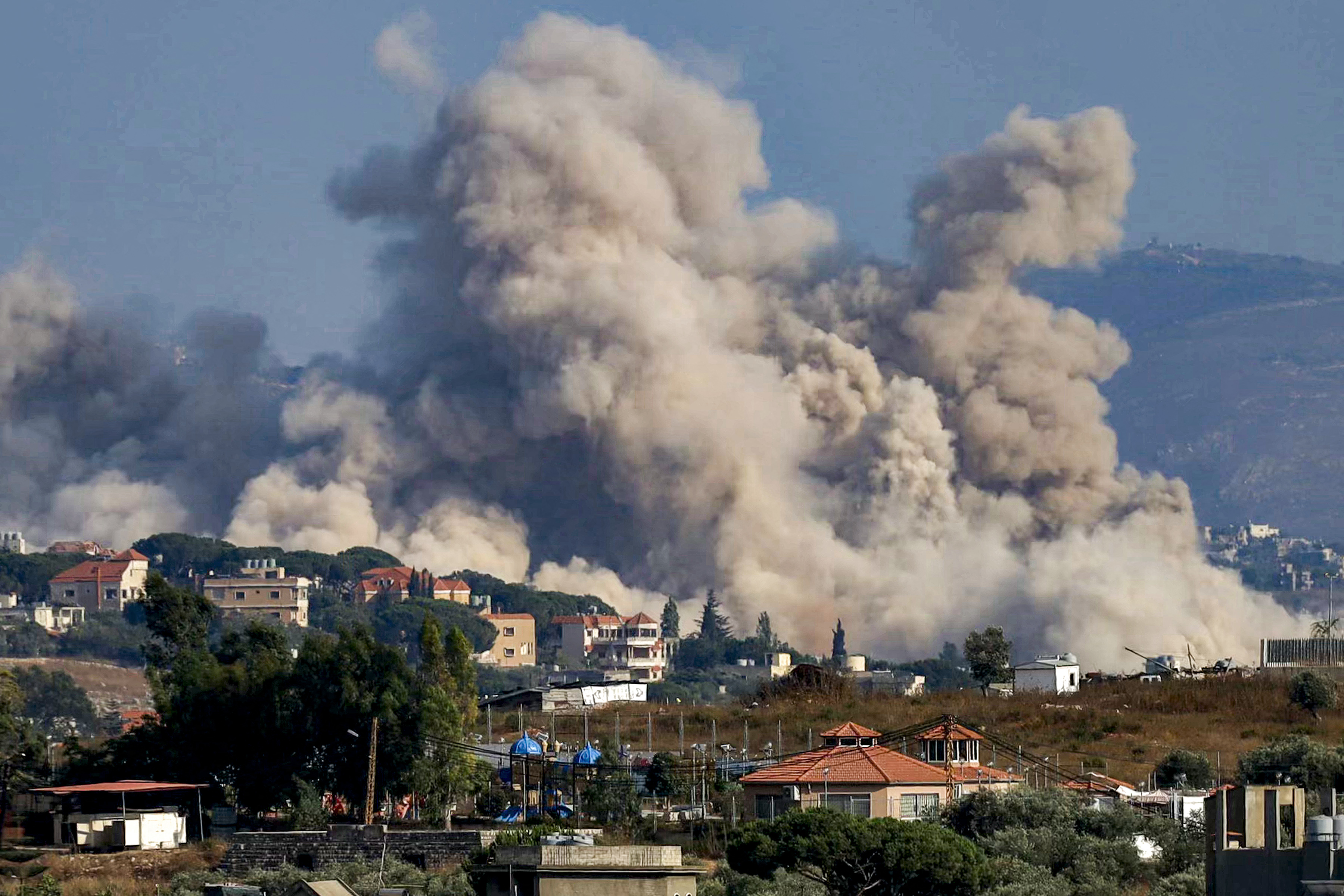 Smoke rises following an Israeli controlled-explosion on the village of Kfartibnit as seen from Nabatieh in southern Lebanon on July 29, 2026.