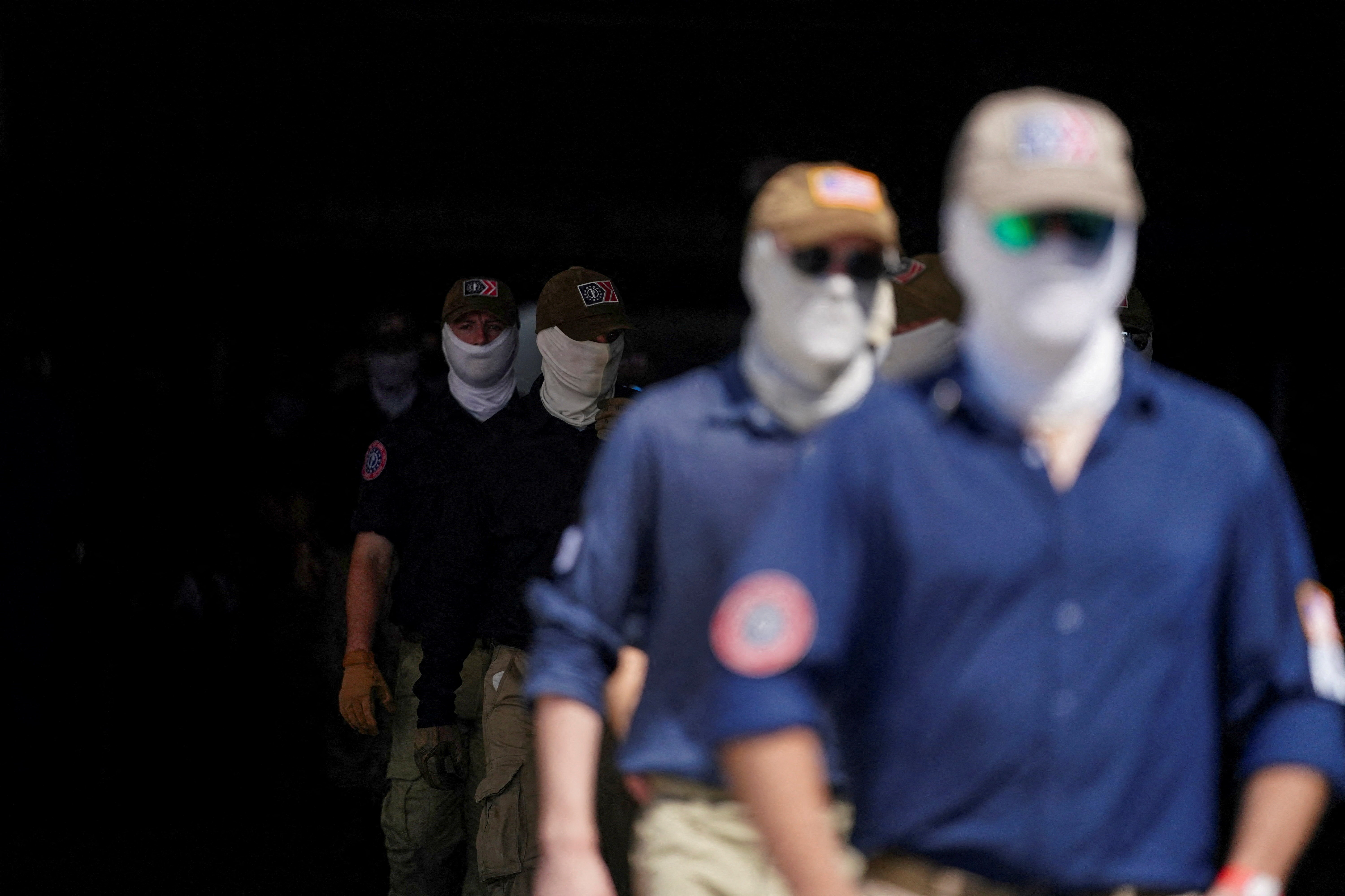 Members of the group Patriot Front exit a metro station, on the 250th anniversary of U.S. independence in New Carrollton, Maryland, U.S, July 4, 2026. REUTERS/Nathan Howard REFILE - CORRECTING LOCATION FROM "WASHINGTON, D.C" TO "NEW CARROLLTON, MARYLAND".
